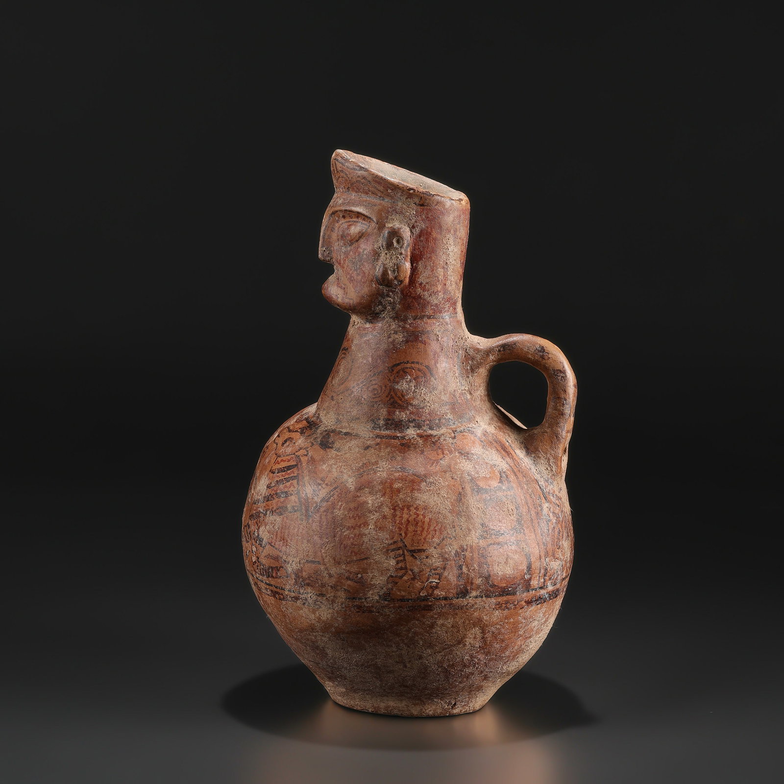 Pre-Columbian Figural Terracotta Vessel with Painted Geometric Motifs: Pre-Columbian Figural Terracotta Vessel with Painted Geometric Motifs Size Detail: 14 x 24cm Weight: 1.2kg