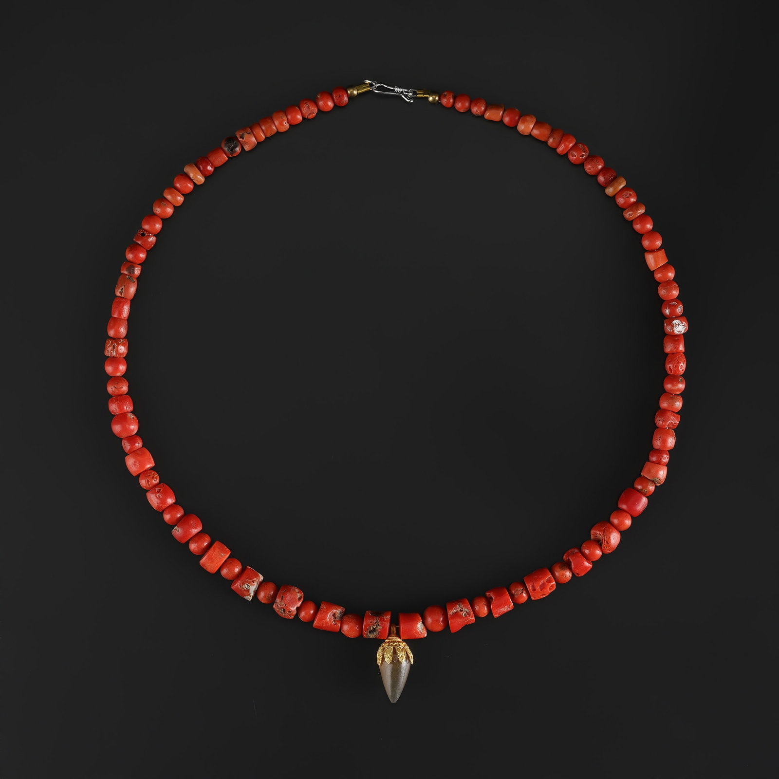 Ancient Coral Beads Necklace With 18K Gold Pendant: Fine Gold Ancient Coral Beads Necklace With 18K Gold Pendant. A desirable auction piece with strong decorative presence and fine gold craftsmanship. Well suited for ethnographic jewelry collectors, di
