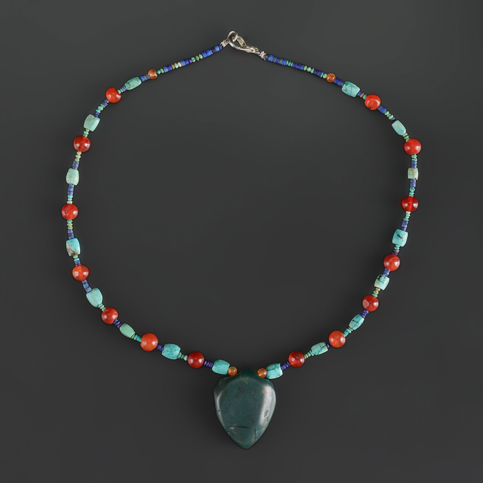Antique Carnelian Turquoise Lapis Beads Heart Shape Aventurine Pendant Necklace: Fine Bead Necklace Antique Carnelian Turquoise Lapis Beads Heart Shape Aventurine Pendant Necklace. A desirable auction piece showing attractive natural color, texture, and character. Well suited for 