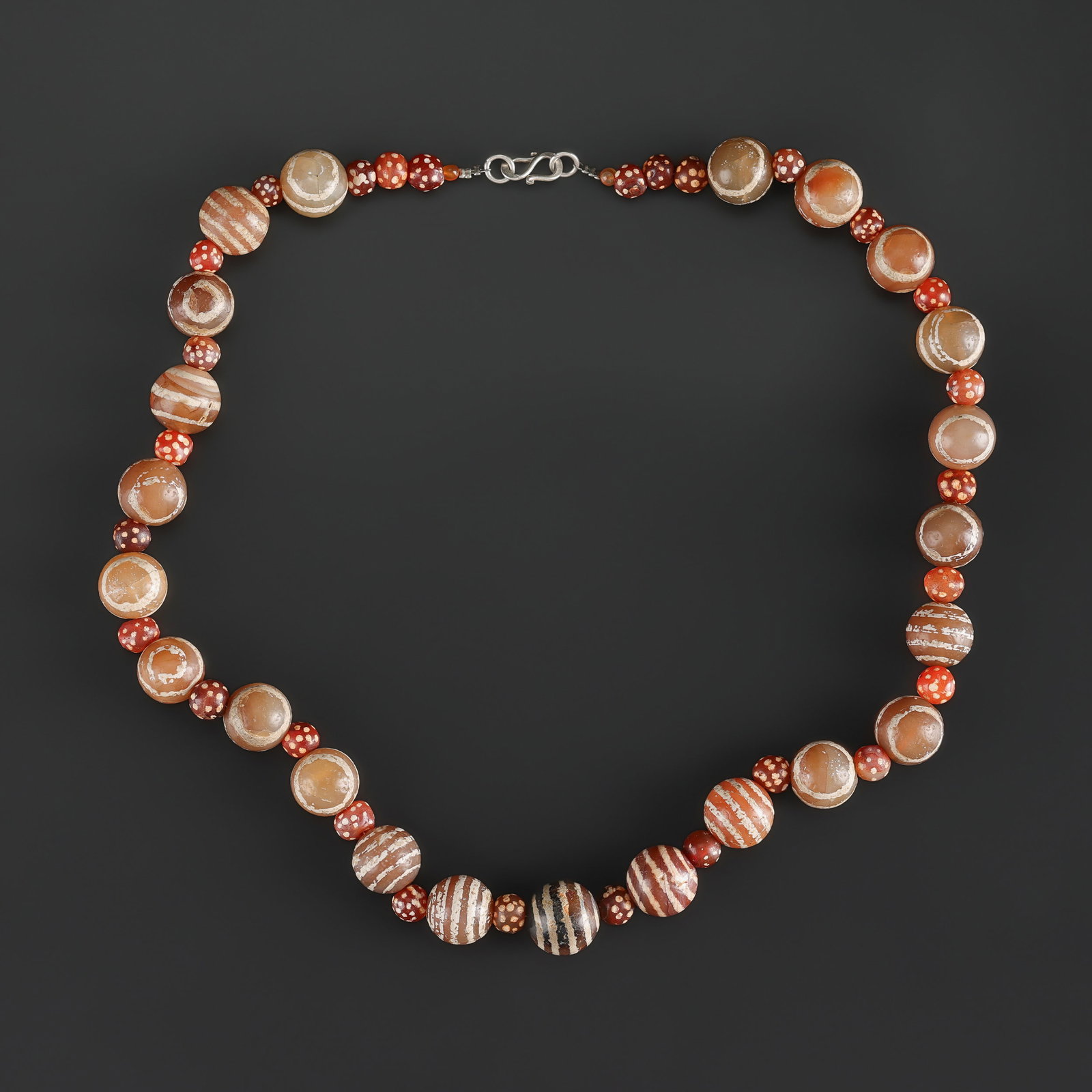 Himalayan Tibetan Tian Zhu Antique Decorated Etched Carnelian Beads Necklace: Fine Bead Necklace Himalayan Tibetan Tian Zhu Antique Decorated Etched Carnelian Beads Necklace. A desirable auction piece showing attractive natural color, texture, and character. Well suited for Tib