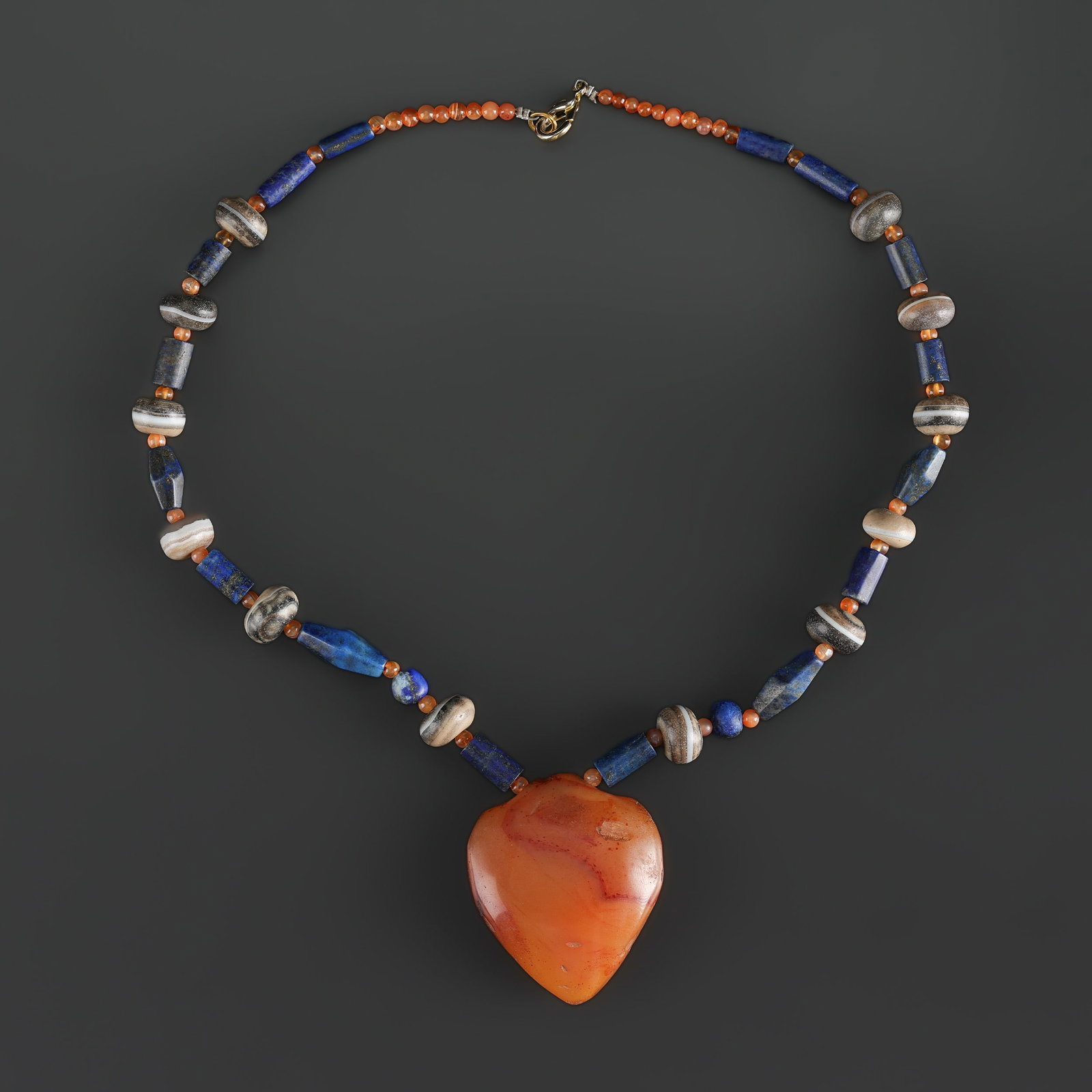 Himalayan Nepali Tibetan Carnelian Rami Agate Lapis Amulet Beads Necklace: Fine Bead Necklace Himalayan Nepali Tibetan Carnelian Rami Agate Lapis Amulet Beads Necklace. A desirable auction piece showing attractive natural color, texture, and character. Well suited for Tibeta