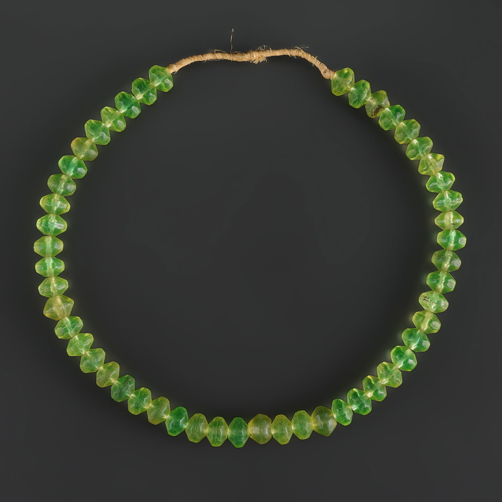 Antique Bohemian Green Faceted Vaseline Glass Beads Necklace: Fine Bead Necklace Antique Bohemian Green Faceted Vaseline Glass Beads Necklace. A desirable auction piece with appealing beadwork and collectible visual character. Well suited for ethnographic jewelr
