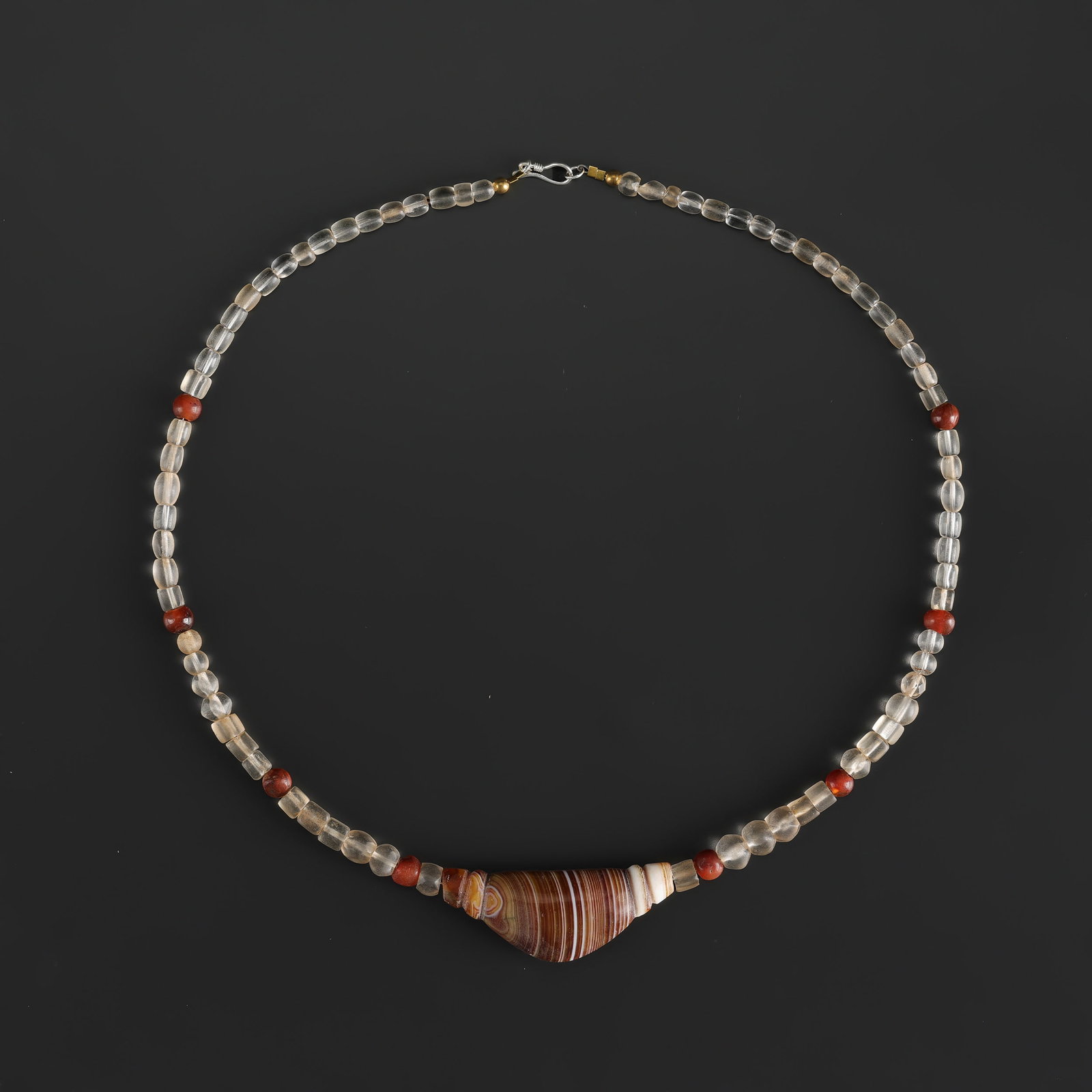 Collection of Antique Mix Old Crystal and Carnelian Beads Necklace with Banded Agate Bead Pendant: Fine Bead Necklace Collection of Antique Mix Old Crystal and Carnelian Beads Necklace with Banded Agate Bead Pendant. A desirable auction piece showing attractive natural color, texture, and character