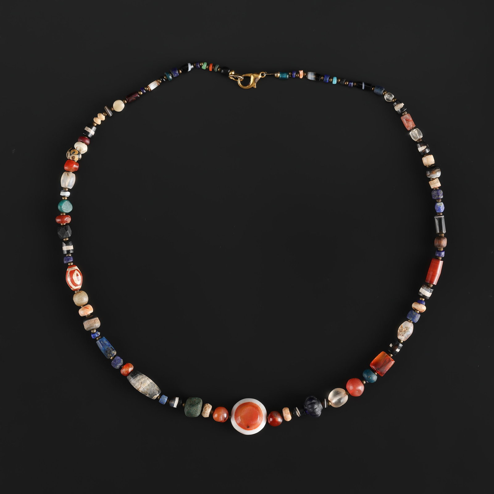 Antique Himalayan Luk Mik Carnelian Old Agate Lapis Crystal Glass Beads Necklace: Fine Bead Necklace Antique Himalayan Luk Mik Carnelian Old Agate Lapis Crystal Glass Beads Necklace. A desirable auction piece showing attractive natural color, texture, and character. Well suited for