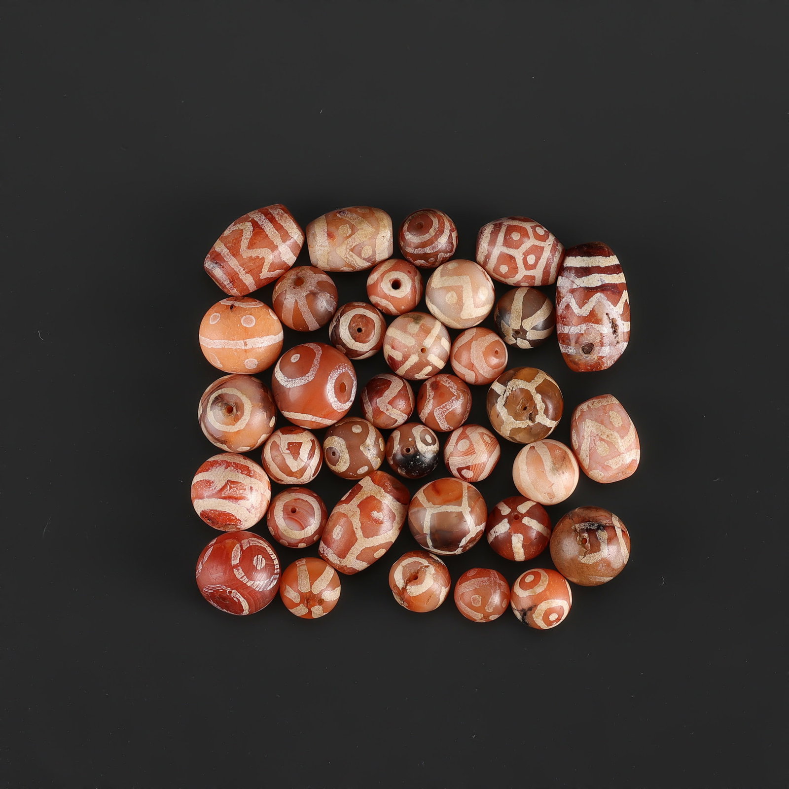 Collection of Antique Old Etched Carnellian Beads Lot: Fine Bead Group Collection of Antique Old Etched Carnellian Beads Lot. A desirable auction piece with appealing beadwork and collectible visual character. Well suited for ethnographic jewelry collecto