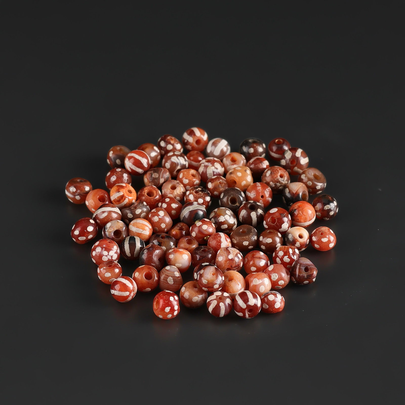 Collection of Antique Old Etched Carnellian Beads Lot: Fine Bead Group Collection of Antique Old Etched Carnellian Beads Lot. A desirable auction piece with appealing beadwork and collectible visual character. Well suited for ethnographic jewelry collecto
