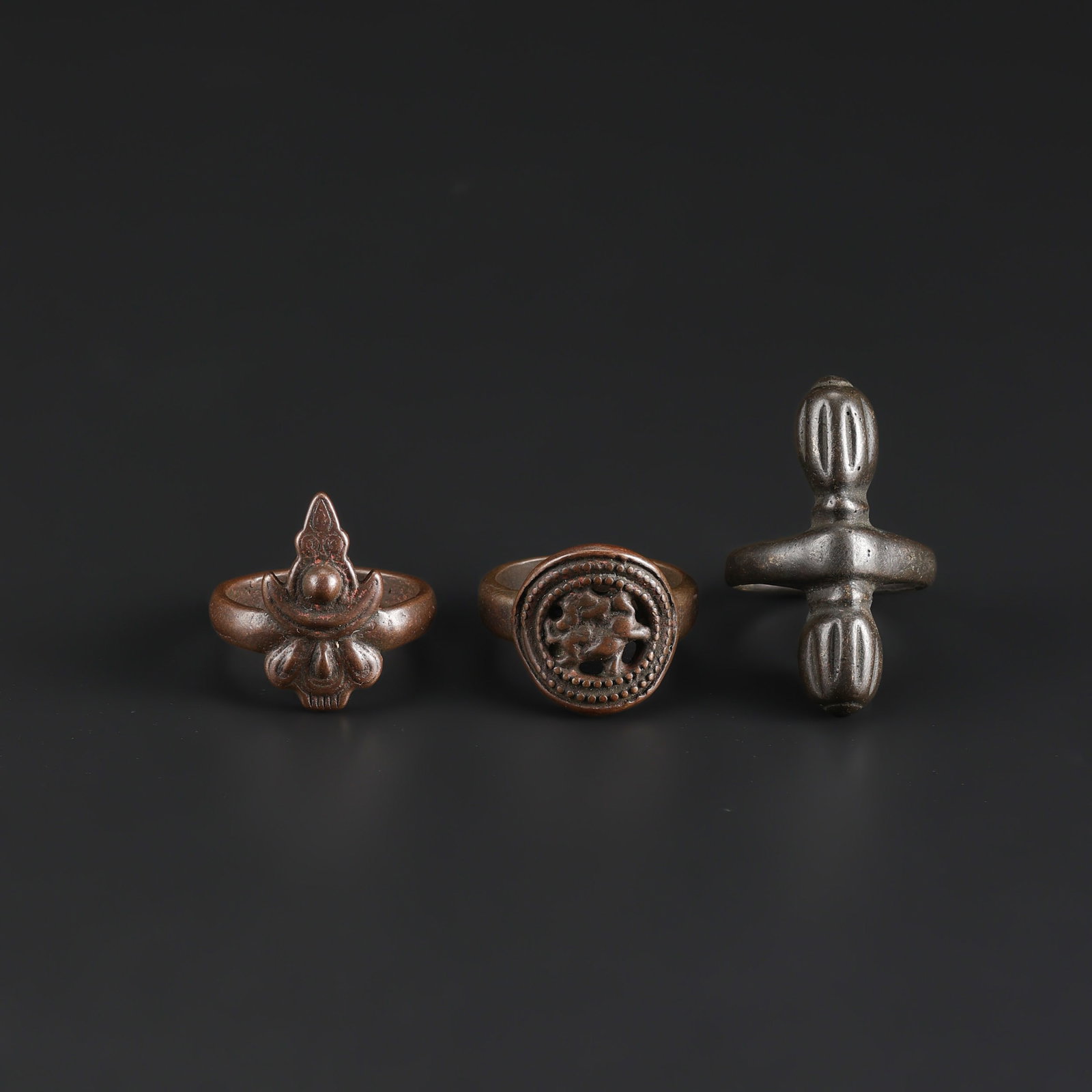 Lot of Old Tibetan Bronze Amulet Rings: Fine Bronze Lot of Old Tibetan Bronze Amulet Rings. A desirable auction piece displaying quality workmanship and collectible character. Well suited for Tibetan and Himalayan collectors, display, or ad