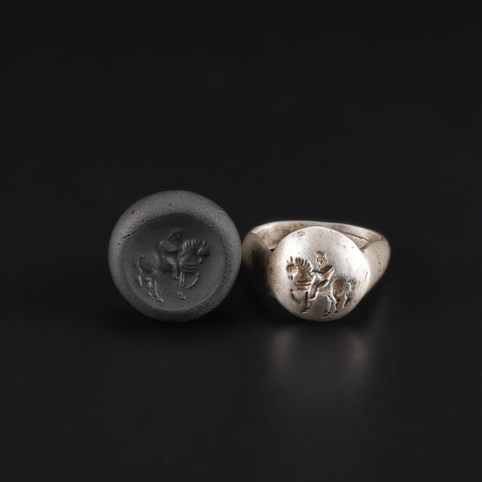 Near Eastern Ancient Greek Silver Ring with Intaglio Stamp: Fine Silver Near Eastern Ancient Greek Silver Ring with Intaglio Stamp. A desirable auction piece displaying quality workmanship and collectible character. Well suited for ancient coin and jewelry col