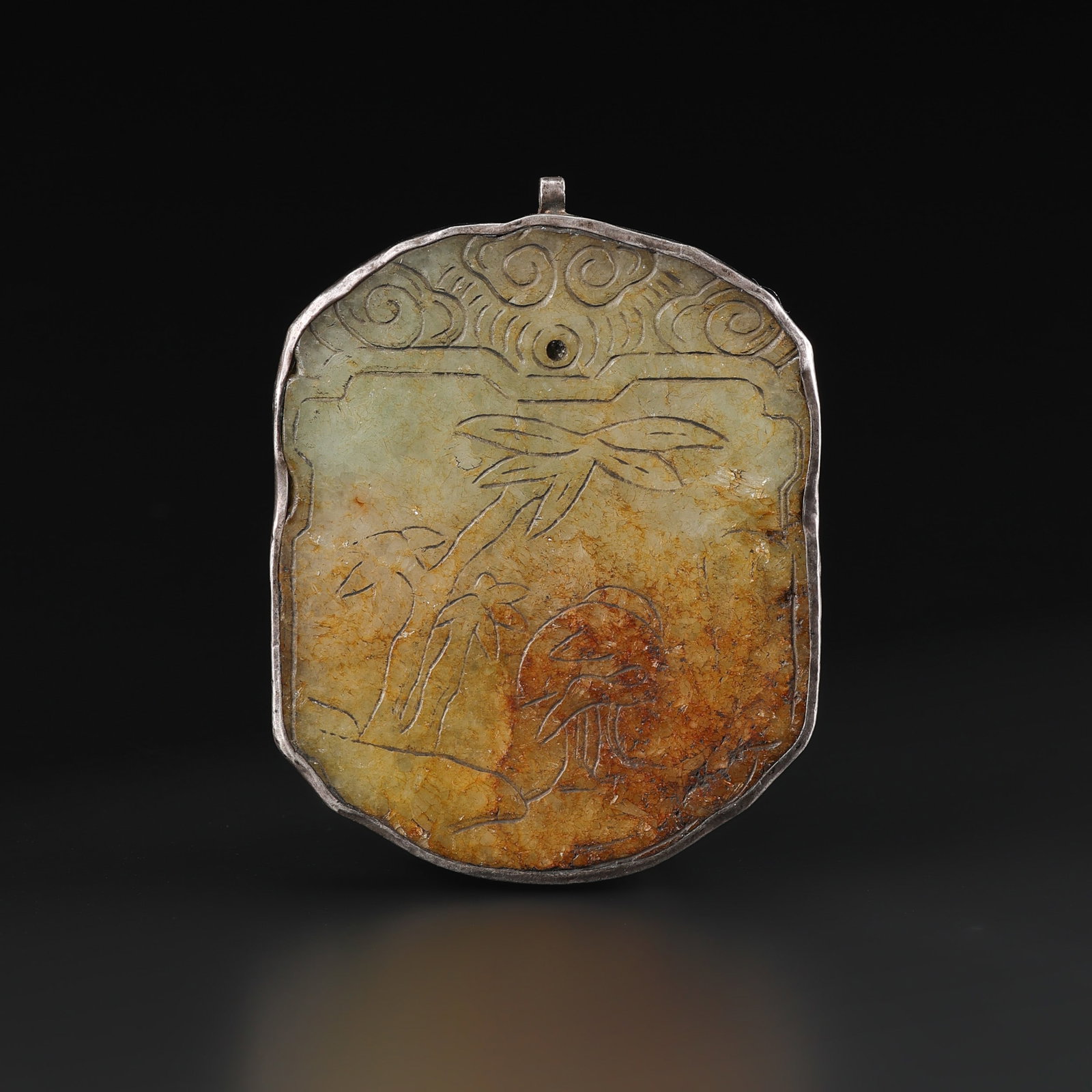 Old Carved Jade Pendant with a Silver Border: Fine Jade Old Carved Jade Pendant with a Silver Border. A desirable auction piece displaying quality workmanship and collectible character. Well suited for antique pendant and amulet collectors, displ