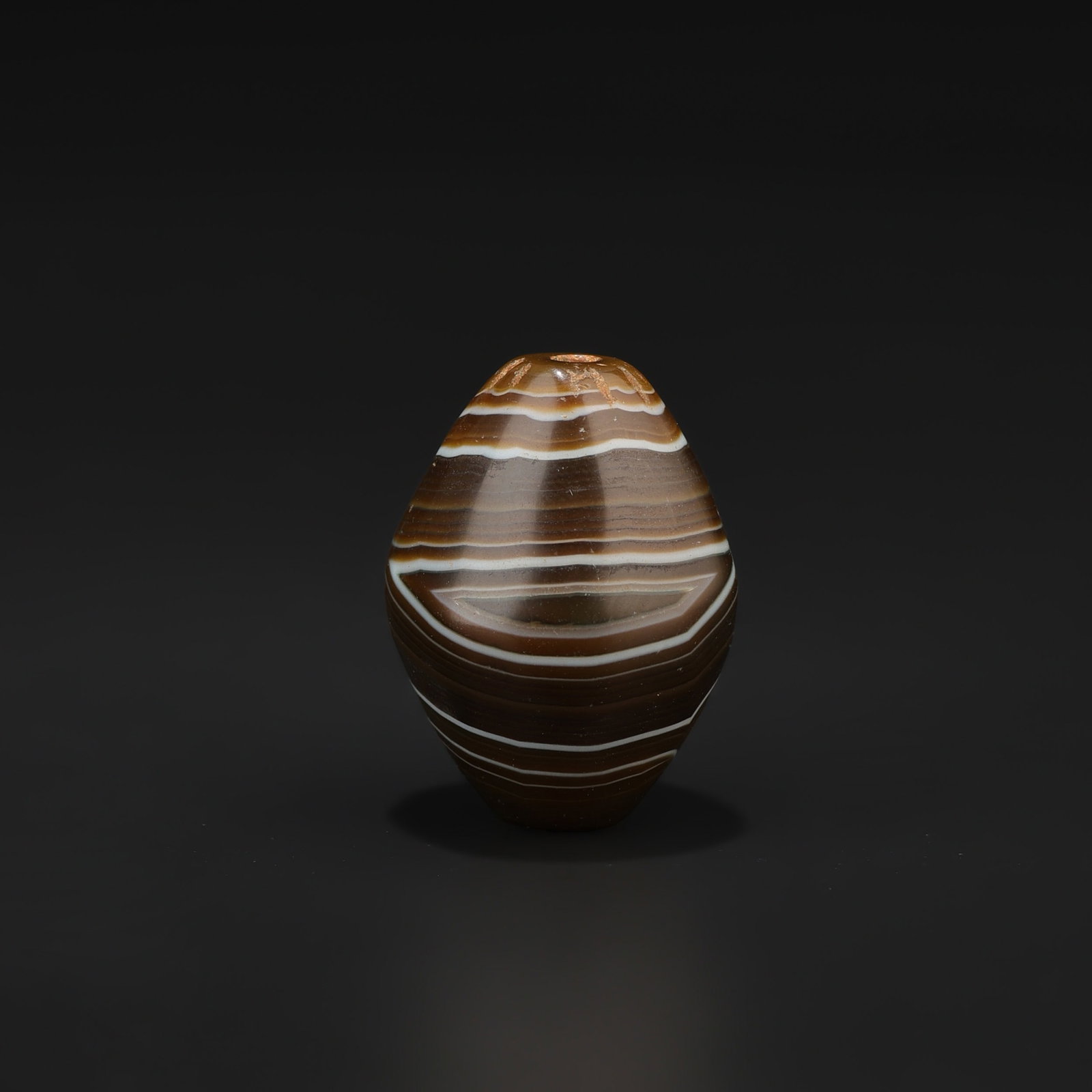Antique Banded Natural Striped Agate Bead: Antique Banded Natural Striped Agate Bead featuring quality craftsmanship and collectible appeal. Suitable for display or collection. Size Detail: 1.9 x 2.5cm Weight: 12gram