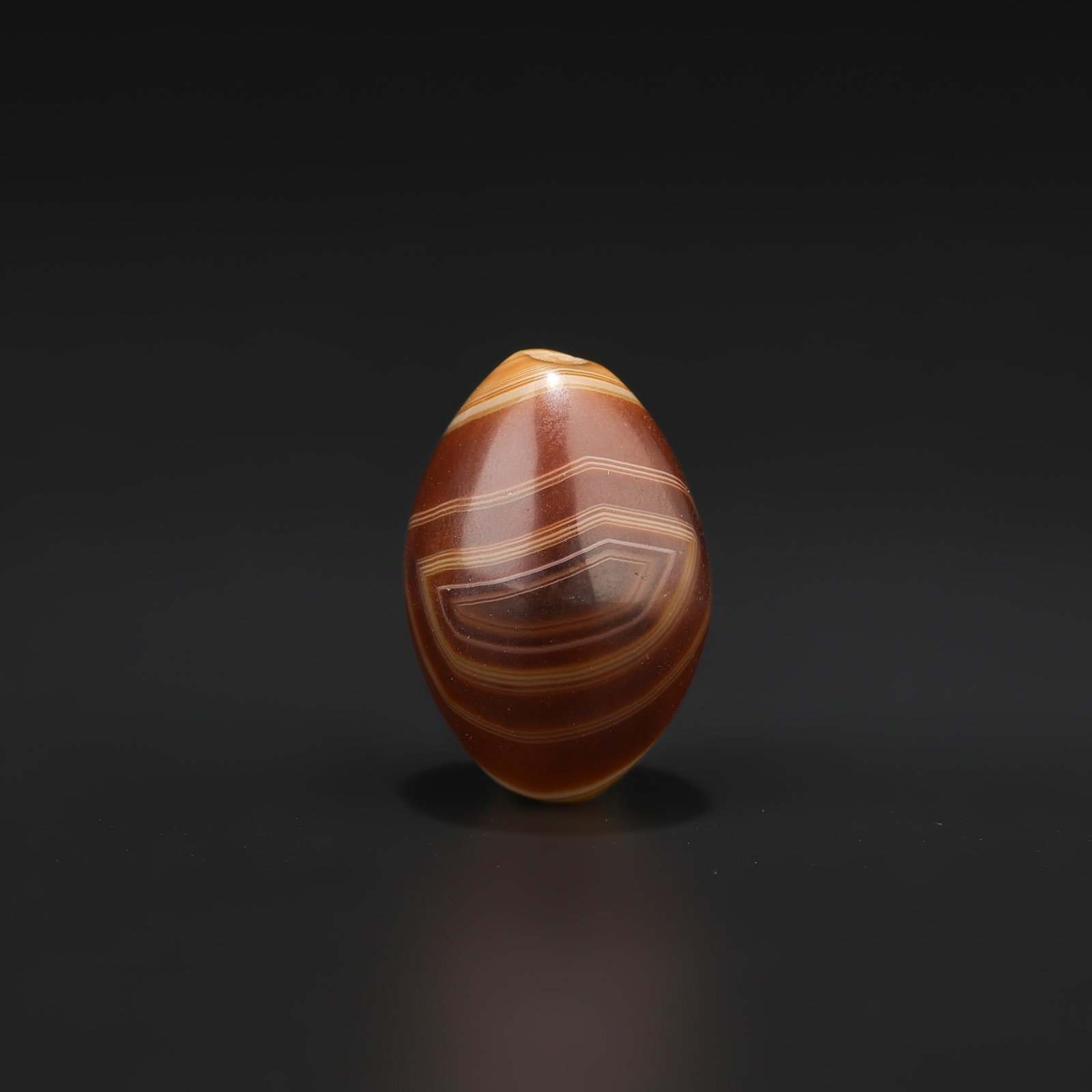 Antique Eye Agate Bead Protective Amulet: Antique Eye Agate Bead Protective Amulet featuring quality craftsmanship and collectible appeal. Suitable for display or collection. Size Detail: 2.5 x 2cm Weight: 10gram