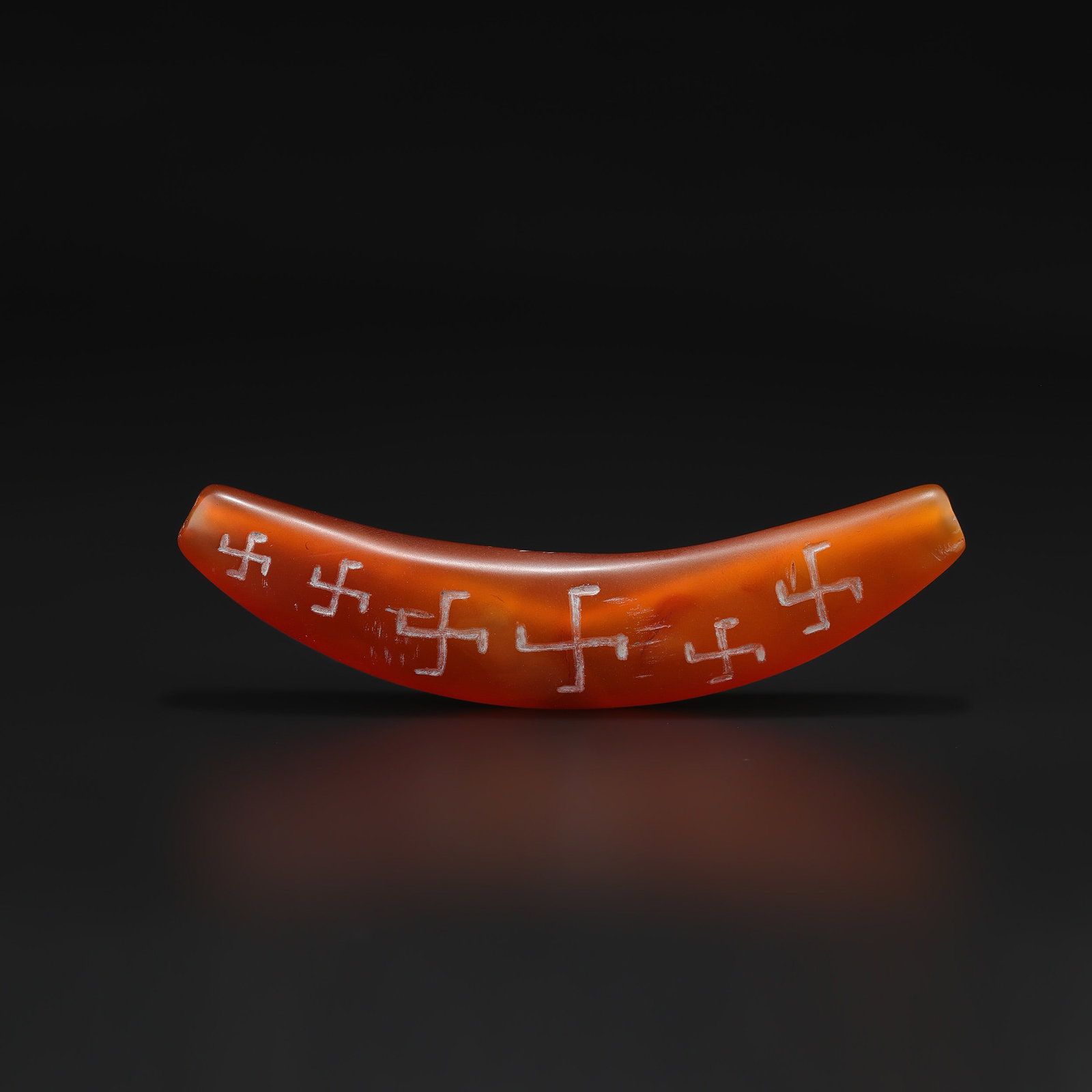 Carved Carnelian Curved Pendant with Incised Motifs Amulet Bead: Carved Carnelian Curved Pendant with Incised Motifs Amulet Bead featuring quality craftsmanship and collectible appeal. Suitable for display or collection. Size Detail: 10 x 3cm Weight: 40gram