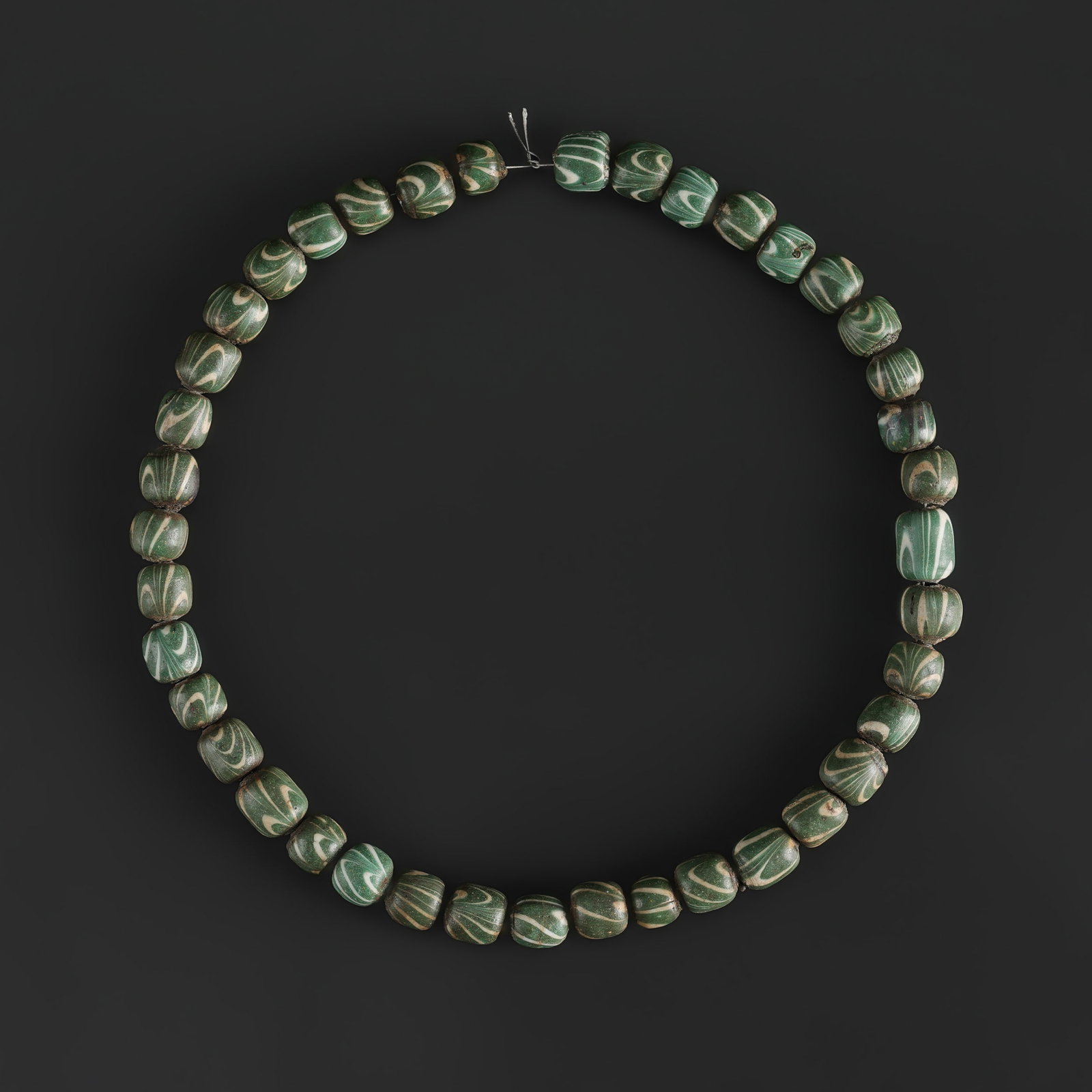 Antique Green Chevron-Pattern Glass Beads African Trade Beads: Antique Green Chevron-Pattern Glass Beads African Trade Beads featuring quality craftsmanship and collectible appeal. Suitable for display or collection. Length: 18in Total Weight: 77gram