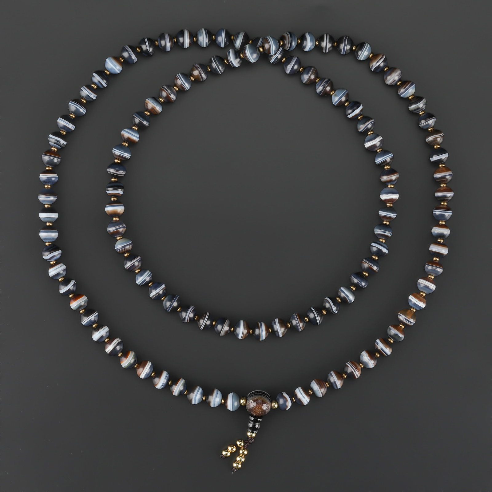 Himalayan Tibetan Rami Banded Agate Prayer Mala Beads: Himalayan Tibetan Rami Banded Agate Prayer Mala Beads featuring quality craftsmanship and collectible appeal. Suitable for display or collection. Length: 37in Total Weight: 80gram