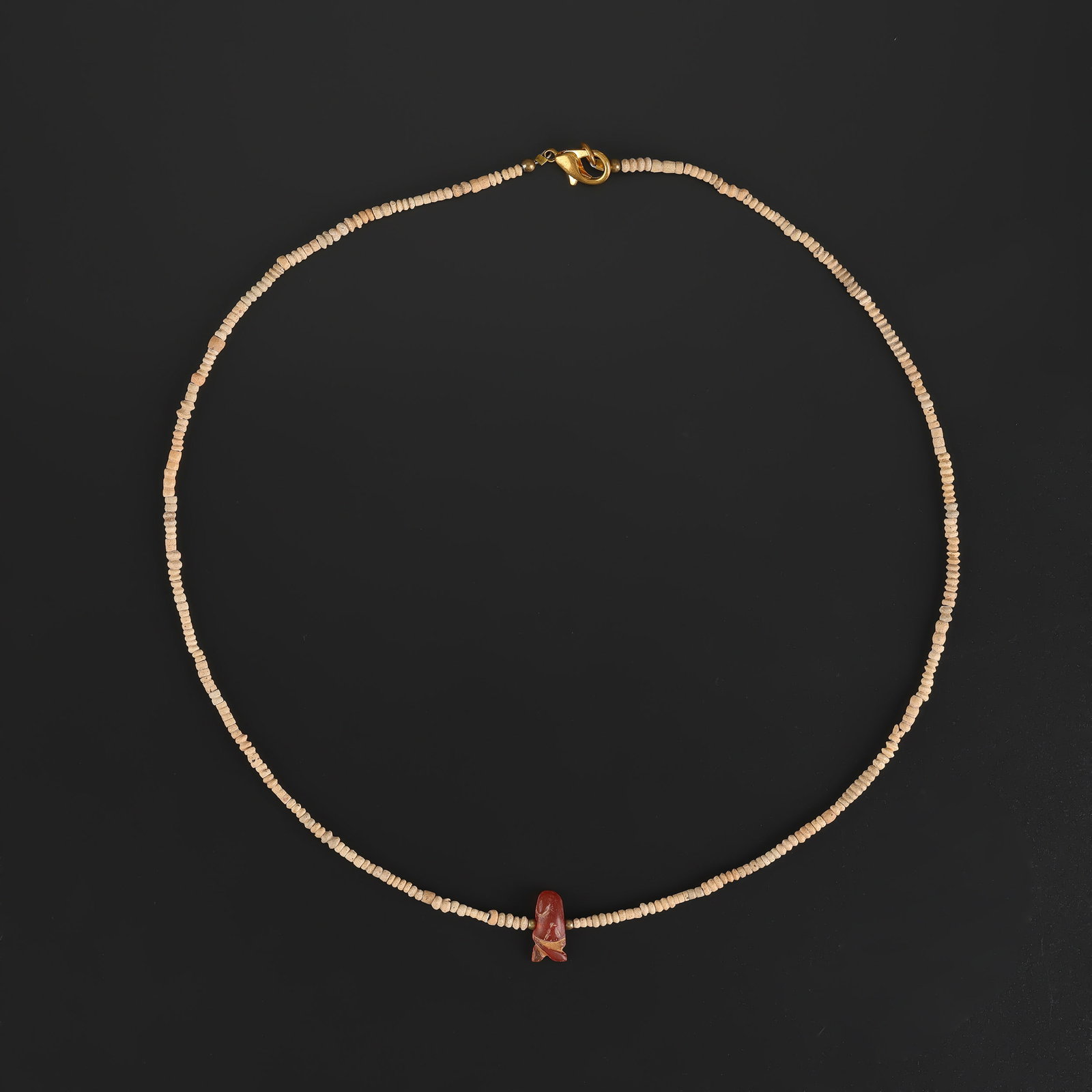 Ancient Carnelian Amulet Bead With Antique Faience Small Size Beads Necklace: Ancient Carnelian Amulet Bead With Antique Faience Small Size Beads Necklace featuring quality craftsmanship and collectible appeal. Suitable for display or collection. Length: 20in Total Weight: 6gra