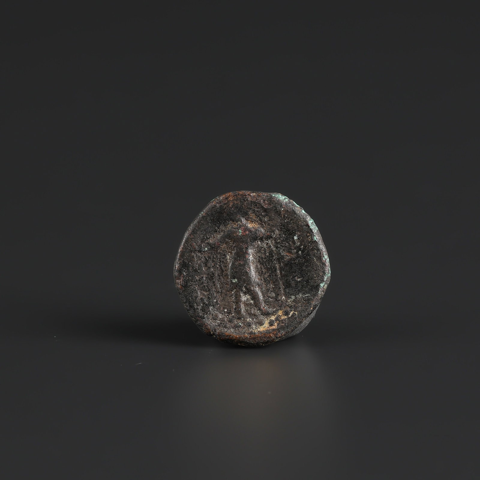 Ancient Indo Greek Bronze Coin: Ancient Indo Greek Bronze Coin featuring quality craftsmanship and collectible appeal. Suitable for display or collection. Size Detail: ?2.4cm Weight: 10gram