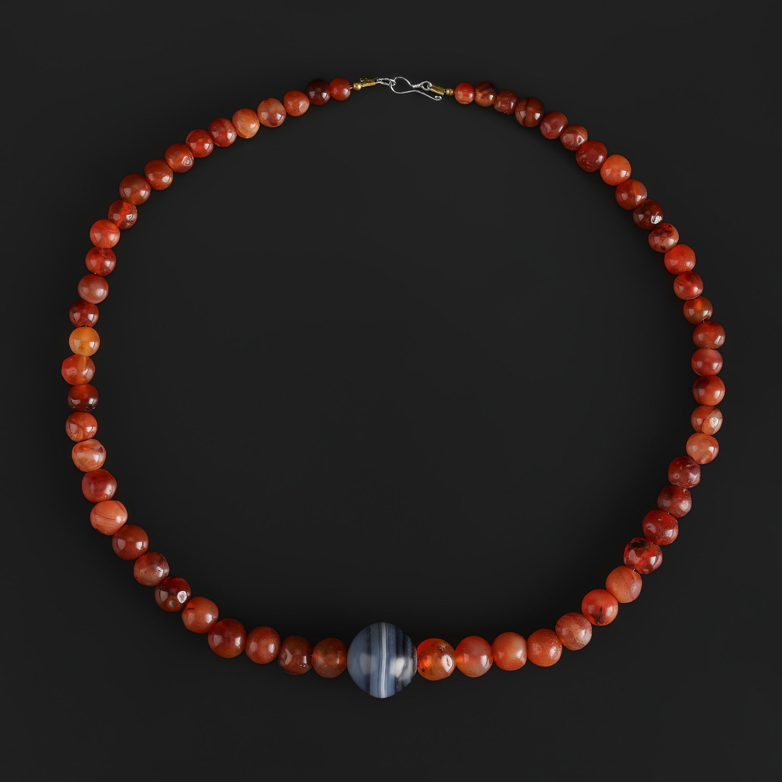 Collection of Ancient Carnelian Beads Necklace with Banded Agate Bead Pendant: Collection of Ancient Carnelian Beads Necklace with Banded Agate Bead Pendant is distinguished by a carefully composed arrangement of color, texture, and decorative detail, offering refined display pr