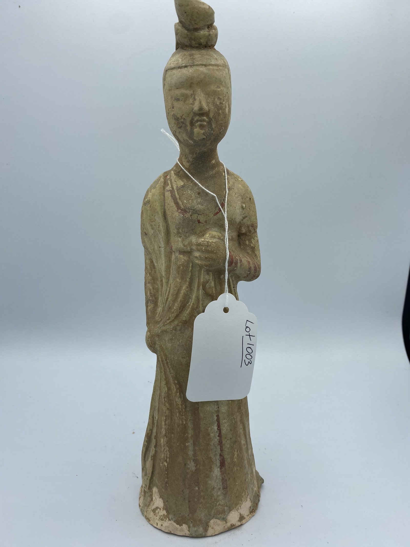 Antique Chinese Terracotta Figure Sculpture of a Woman: Antique Chinese Terracotta Figure of a Woman. Remnants of white and red polychrome.