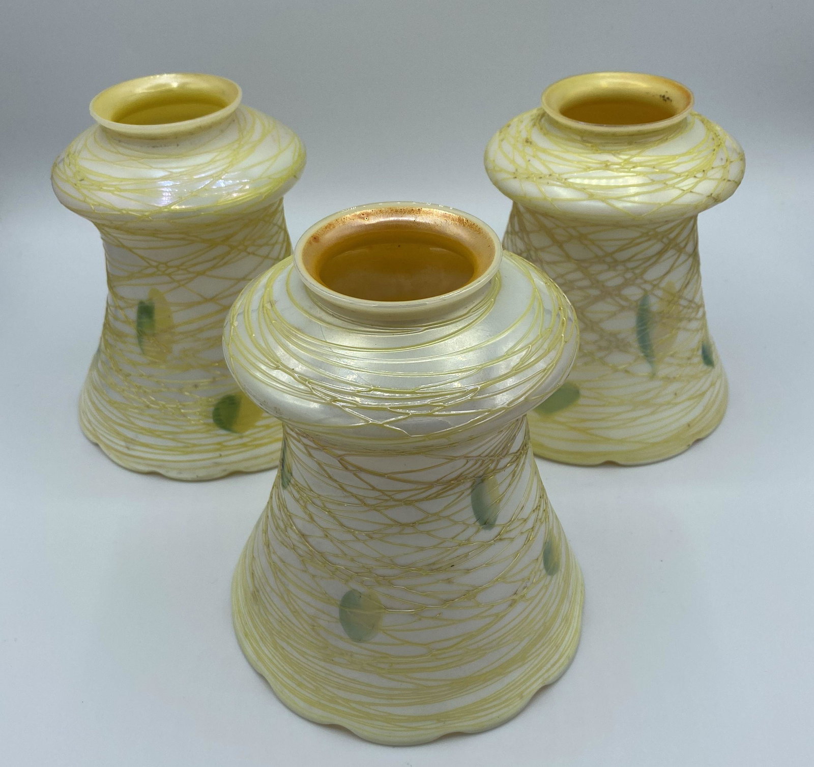 Lot of 3 Antique Iridescent Threaded Glass Lamp Shades: Lot of 3 Antique Iridescent Threaded Glass Shades. Similar to Stuben, Tiffany, or Quezel style but unsigned.