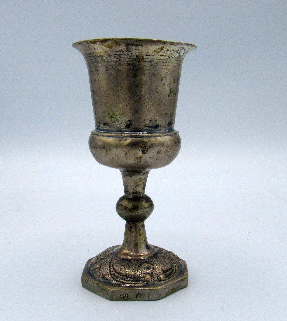 Early 19c. Polish 12 Silver Footed Kiddush Cup Beaker: Early 1800s Polish Silver Footed Kiddush Cup Beaker; Poland; 4 inches tall. Hallmarked with Polish 12 silver mark and a maker's mark on the foot.