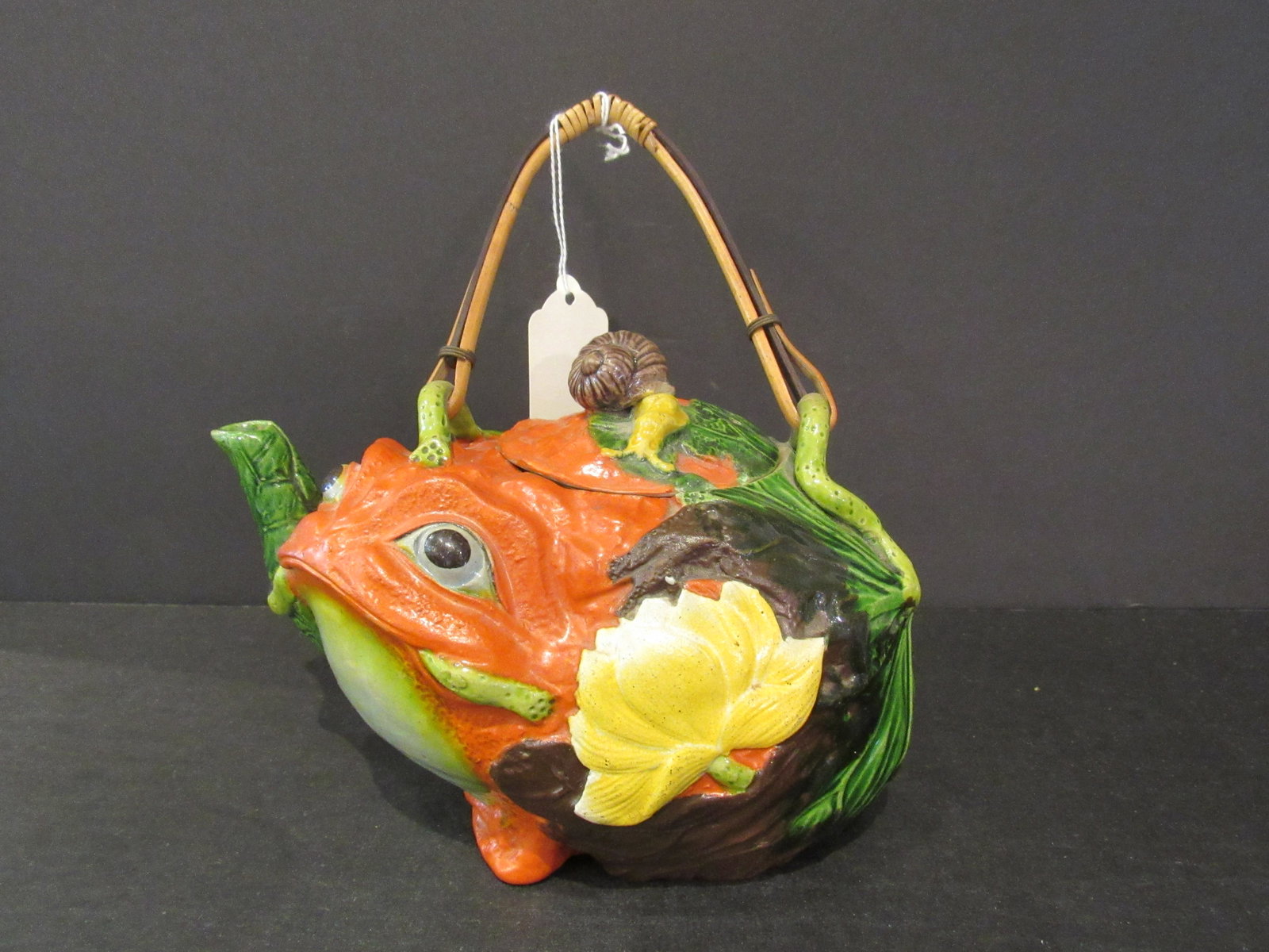 Vintage Japaneses Banko Frog Teapot Hand-Painted: Vintage Japaneses Banko Frog Teapot Hand-Painted. One spout. Bamboo handle. Frog in a lily pond, small two inch snail serves as knob for cover.