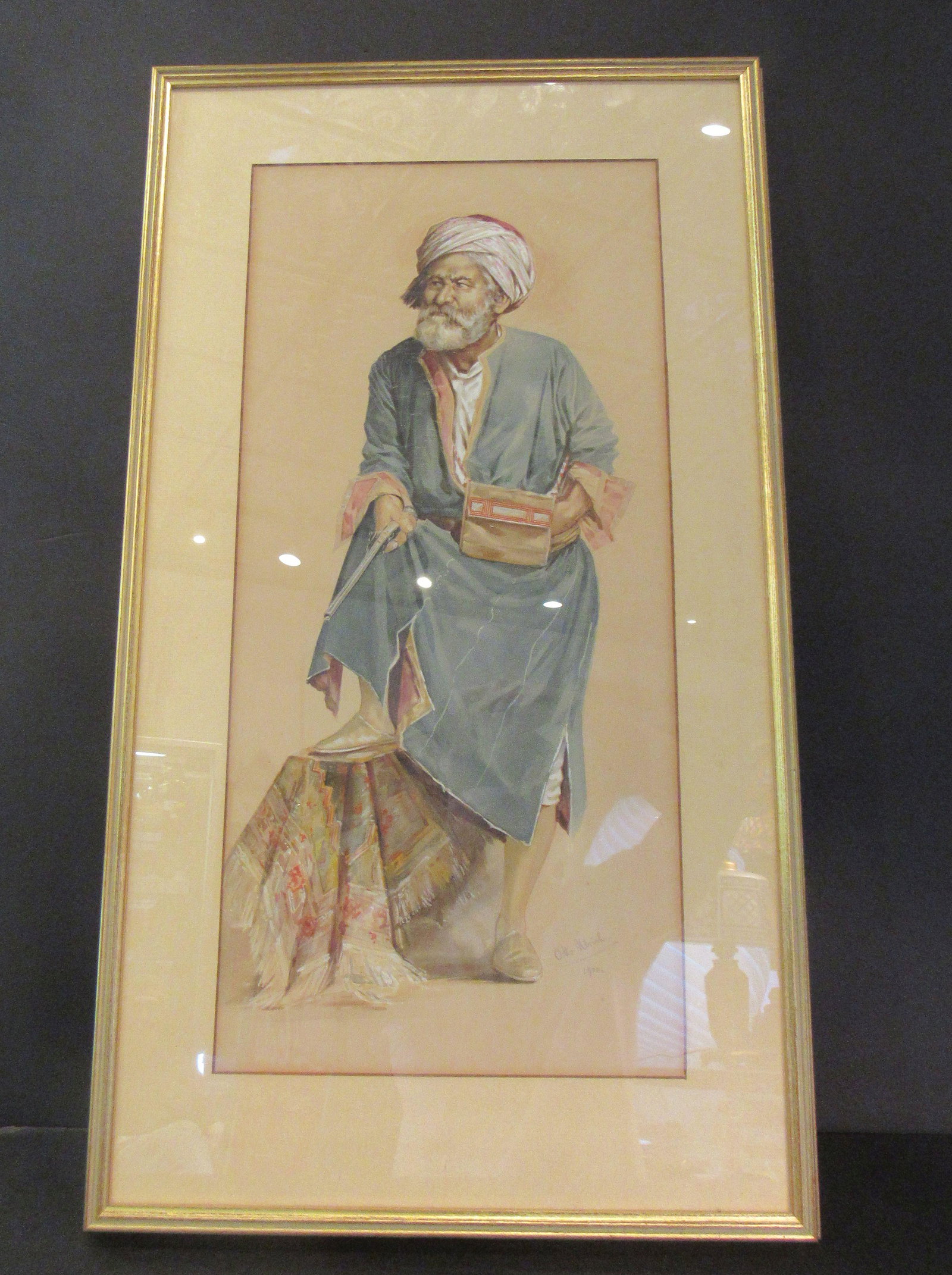 Hand-Painted Signed Watercolor Painting Arab Oriental: Hand-Painted Signed Watercolor Painting Arab Oriental Man With Turban and Pistol. Middle eastern, Arab, Indian man with pistol in his right hand, foot on top of table with rug. Dated 1900. Signed. Wel