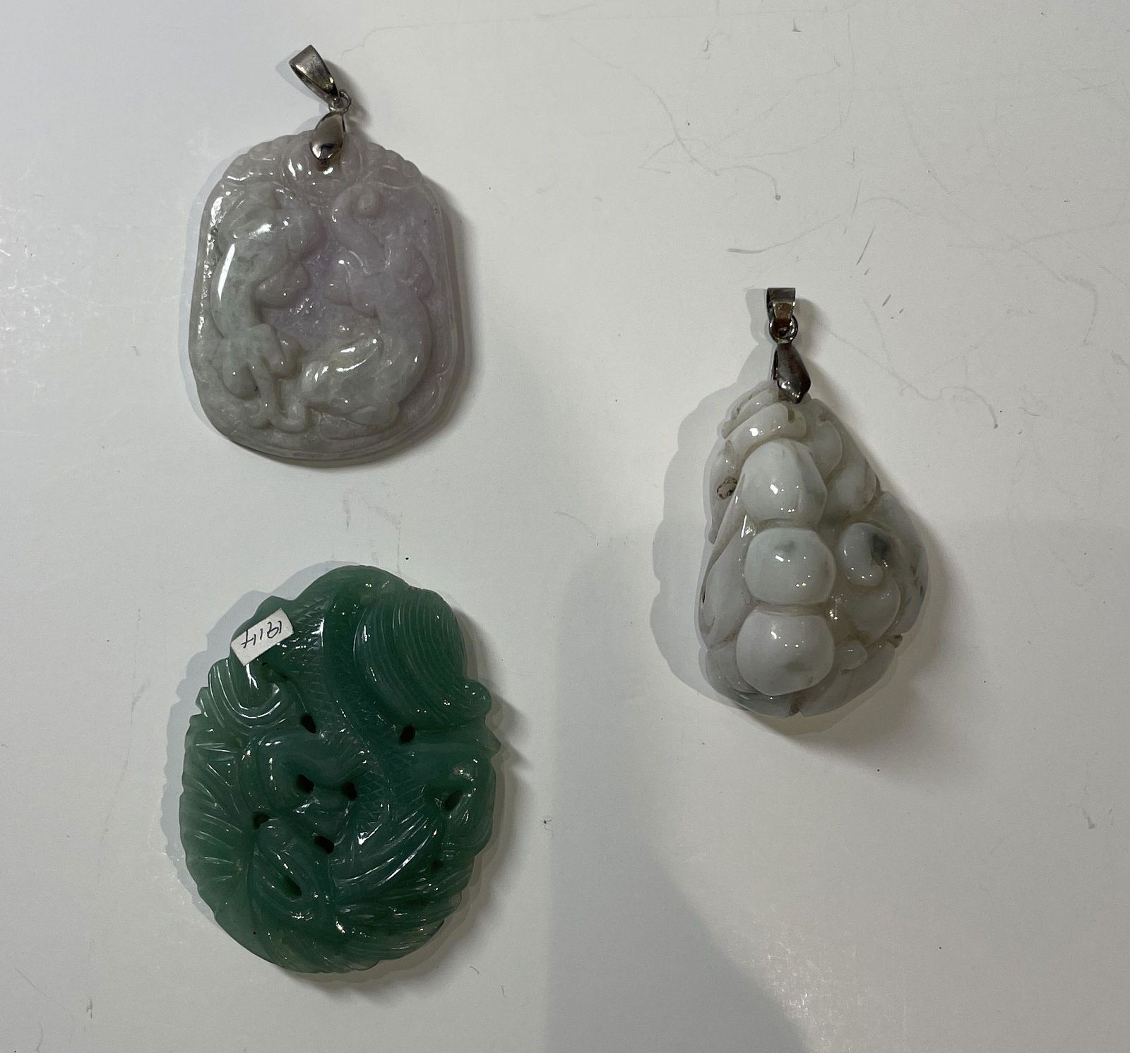 Lot of three large Chinese carved jade jadeite pendants (1 of 2)
