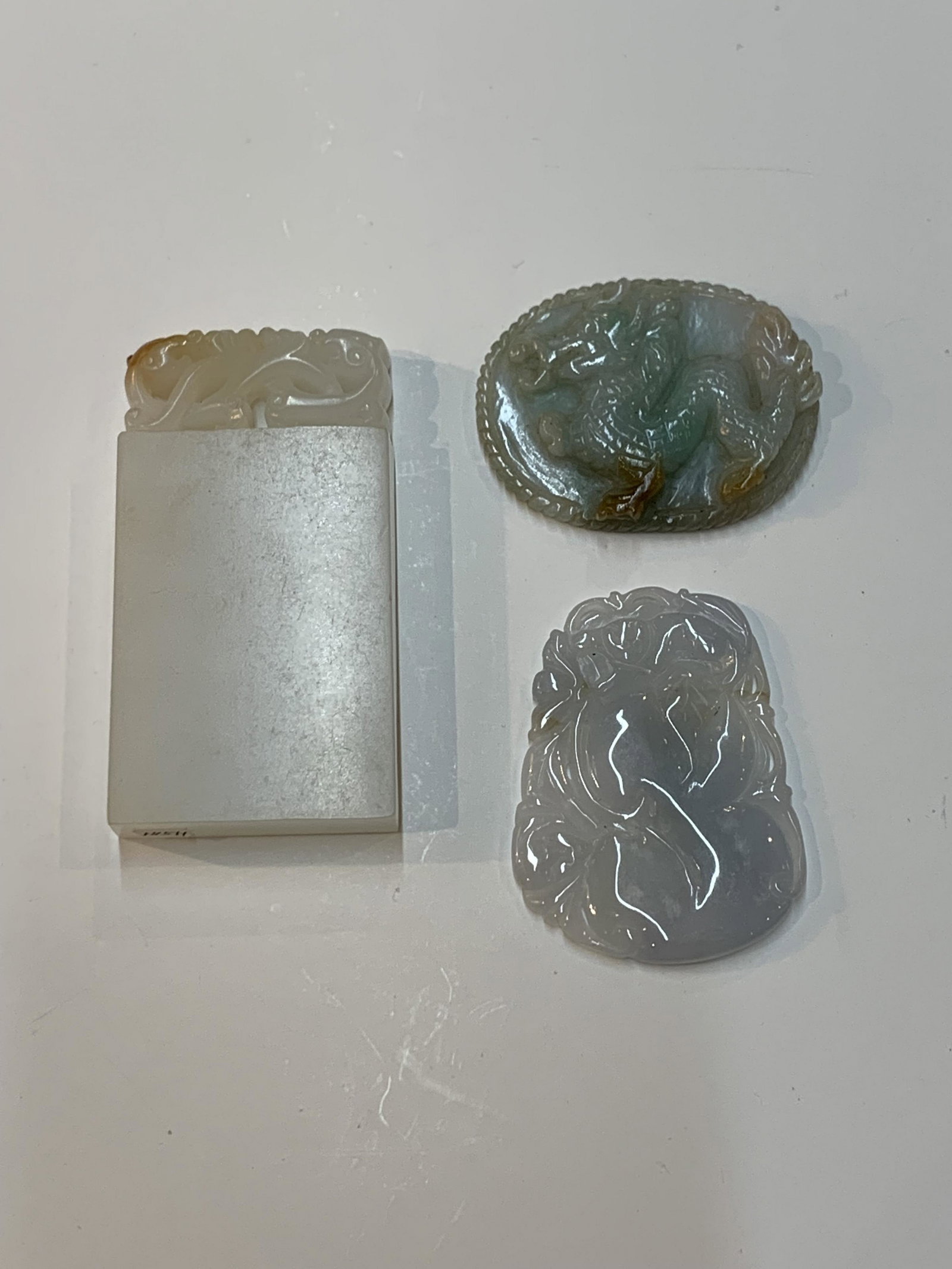 Lot of three Chinese carved jade jadeite plaques (1 of 2)