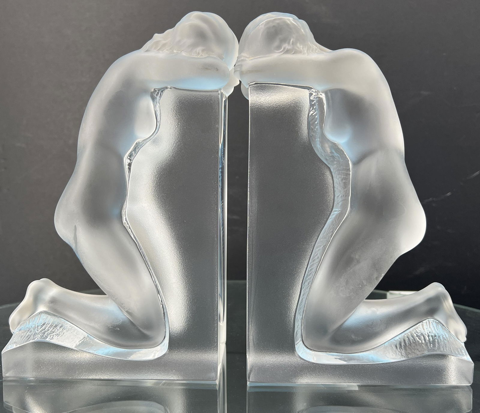 Vintage Lalique France Glass Figurine Nude 'Reverie' Bookends: Vintage Lalique French Frosted Glass Nude 'Reverie' Bookends. Signed on bottom. No chips or cracks.