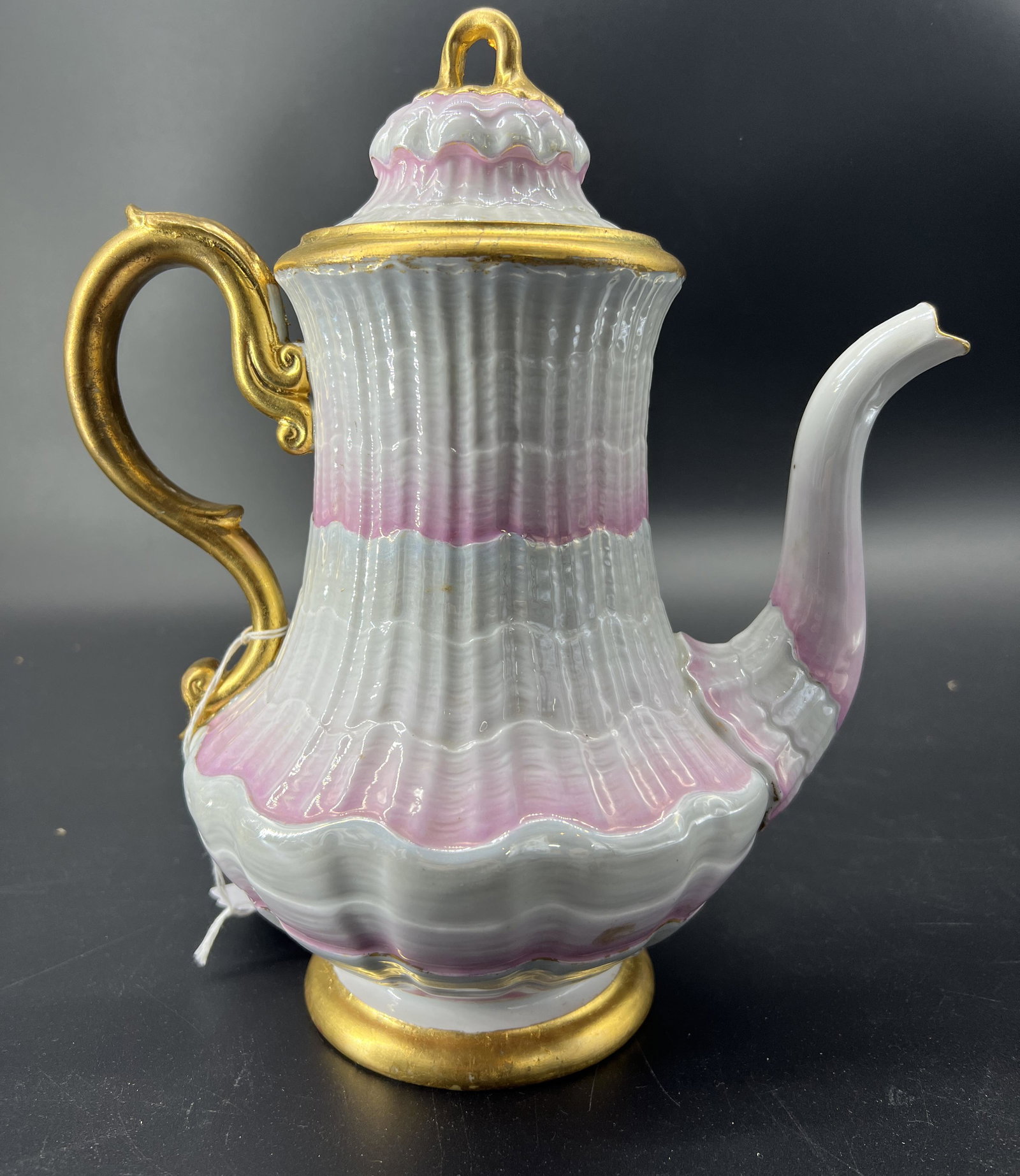 Antique Meissen Porcelain Teapot Pink & Gilt: Antique Meissen Porcelain Teapot. Cross swords mark on the bottom. Pink & Gilt pattern. There is a chip on the lid.