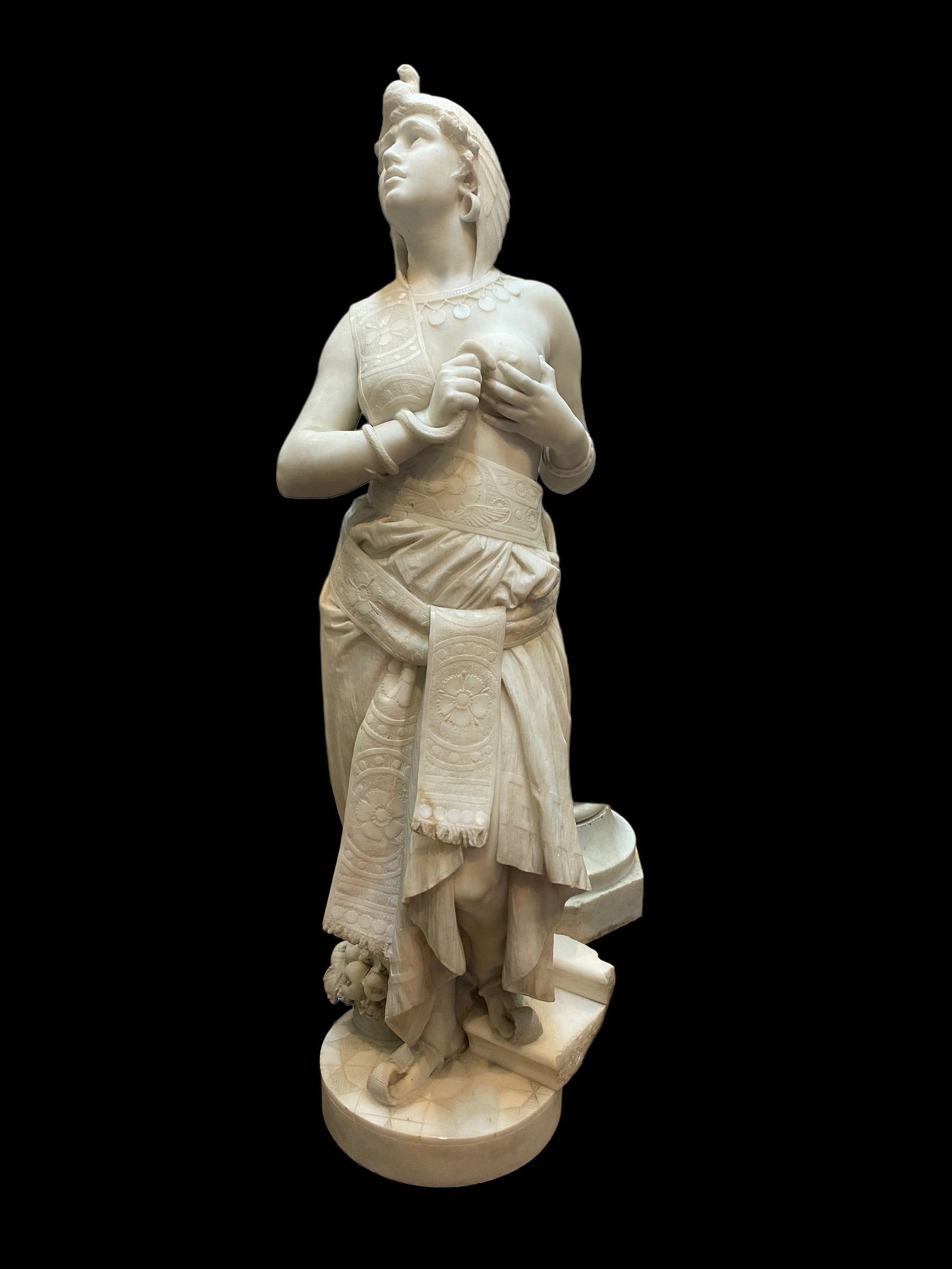 Raffaello Romanelli (Italian, 1856-1928) Signed Marble Sculpture Semi-Nude Cleopatra: Antique Romanelli signed massive marble sculpture of a semi-nude Cleopatra with an asp snake. Artist signed at the back bottom. Sculpture's height measures at approximately 45.25". There is an area th