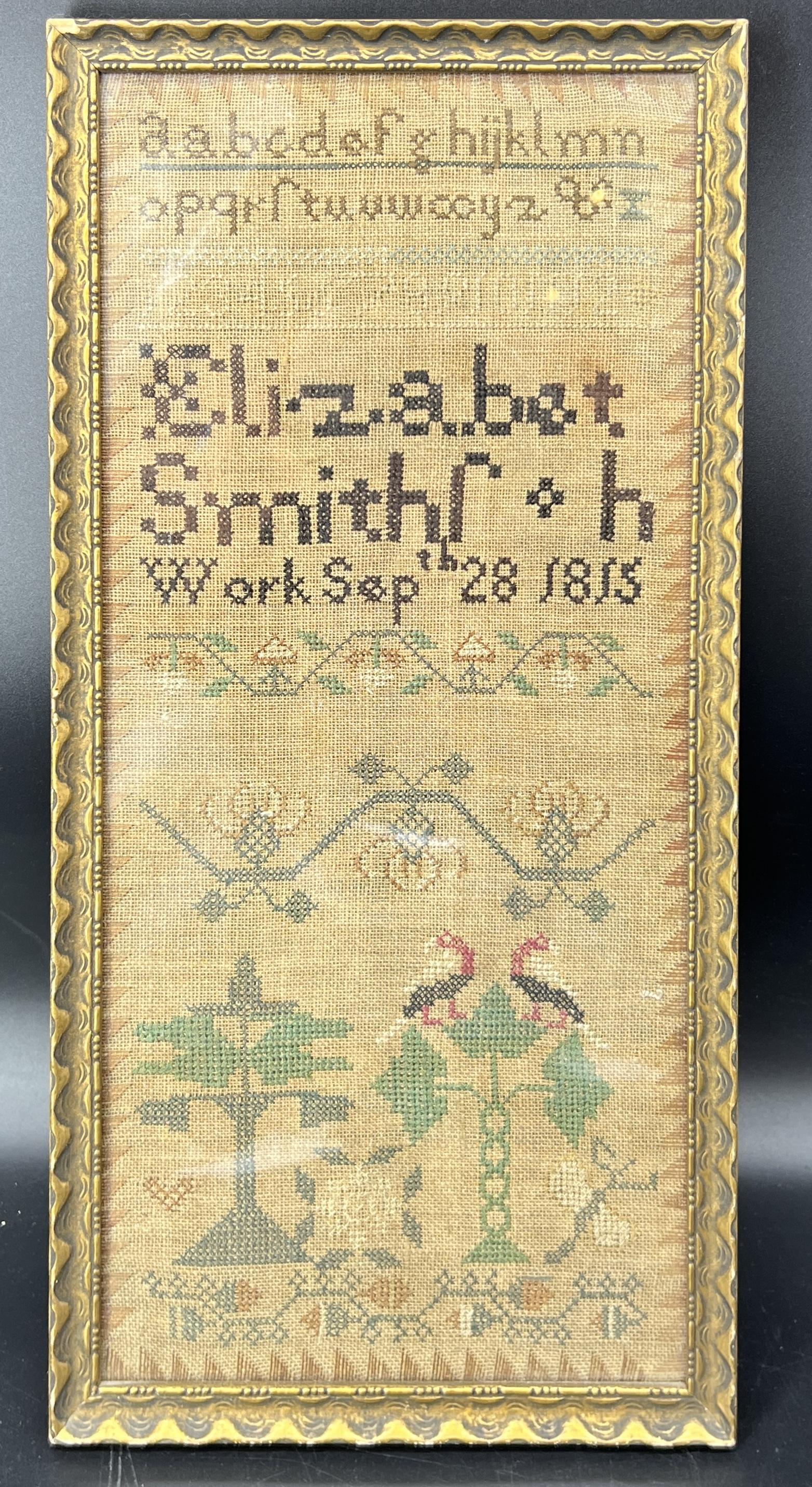 Antique Framed Primitive Sampler 1815 Elizabeth Smiths Susquehanna Region: 7.5" x 17". Mostly cross stitch and flat stitch in red, gold, green, blue, black, & white. Saw tooth border all around, alphabet in lower case, numbers 1-12, strawberry border, honeysuckle border, aco