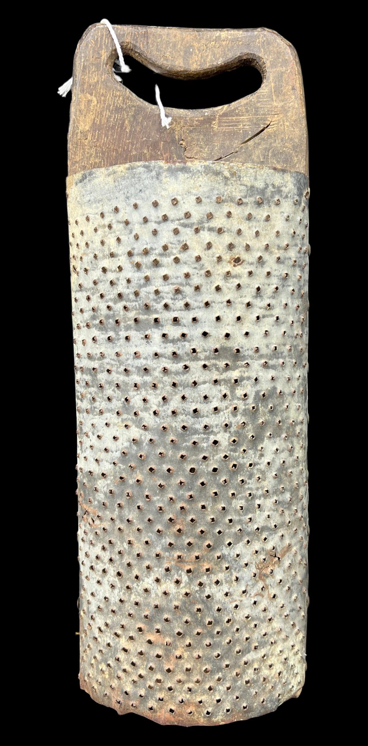 Antique Primitive Large Hand Made Wood & Metal Grater: Antique primitive grater. Made of metal with a wooden base/back. Size: 19" x 7" x 2.5".