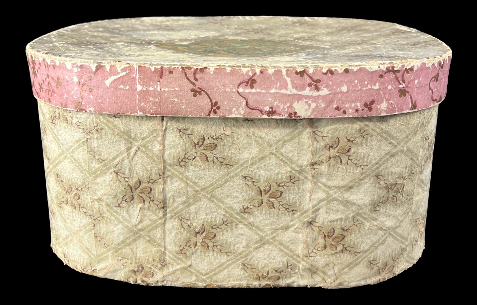 Antique Primitive Pantry Box Wallpaper Design: Antique Primitive Lidded Pantry Box covered in Wallpaper. Inside is lined with newsprint. Floral design. Newspaper dates are 1866. Size: 5.75" x 11.5" x 8.5". Folk art.