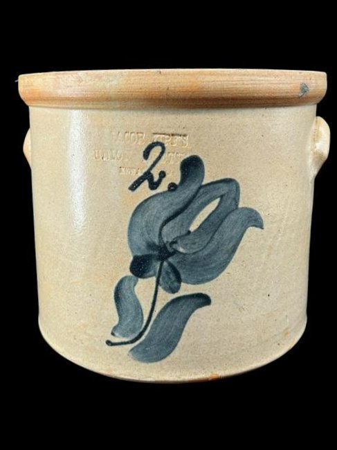 Antique Primitive Stoneware Pottery Crock Jug Union Pottery Jacob Zipf: Antique primitive stoneware crock w/ elephant ear handles. Stamped Jacob Zipf, Union Pottery, Newark, NJ. Has a cobalt blue floral design that overlaps the stamped information. Size: 9" x 10.5".