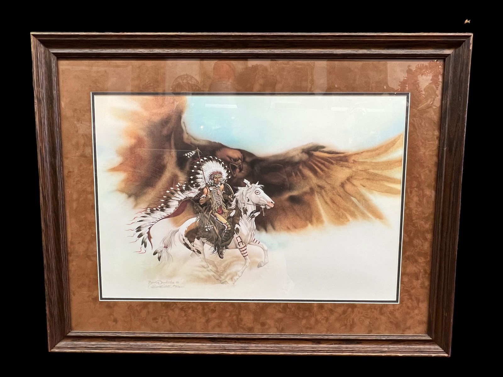 Vintage Bev Doolittle (American, 1947-Present) 'Rushing War Eagle' Native American Lithograph: Rushing War Eagle.' Framed lithograph by Bev Doolittle (American, 1947-Present). Native American. Frame Size: 34.25" x 26.25". Painting Size: 26.75" x 16.5". Hand signed on bottom right.
