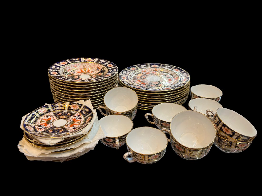 Antique Royal Crown Derby for Tiffany & Co. New York Made in England Imari Pattern: Antique Royal Crown Derby for Tiffany New York Made in England Imari Pattern. 3 different signatures on bottoms; green, pink, and purple. Includes (10) Dinner plates (9"), (9) Soup Bowls (8"), (18) Sa