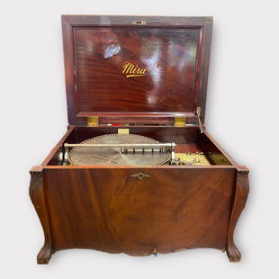 Antique Mira Large Windup Music Box 15 1/2" Disc: Early 20th c. possibly cherry cased countertop, Swiss made music box, double comb mechanism, with side crank. Very good, working condition.