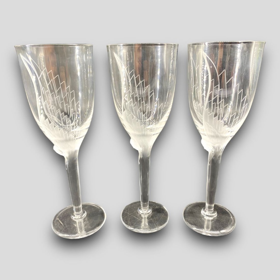 Vintage Lot of 3 Lalique France 'Angel' Champagne Glasses Flutes: Vintage Lot of 3 Lalique France 'Angel' Champagne Glasses Flutes. Vintage Lot of 3 Lalique France Glass Glasses. No chips or cracks. Signed on the bottoms.