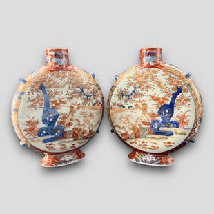 Antique Japanese Pair Koransha Pottery Moon Porcelain Flasks: Antique Japanese Pair Koransha Pottery Moon Porcelain Flasks. Signed on the bottoms. No chips or cracks. Depicts two workers in fields, with floral design. Approximate size: 9.25'' x 7.75'' x 2''