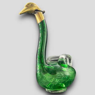 Antique Austrian Green Glass Swan Decanter: Antique Austrian Green Glass Swan Decanter. Marked Austria on the head. Silverplate head. There are chips to the rim of the base. Approximate size: 11.75'' x 10'' x 6''