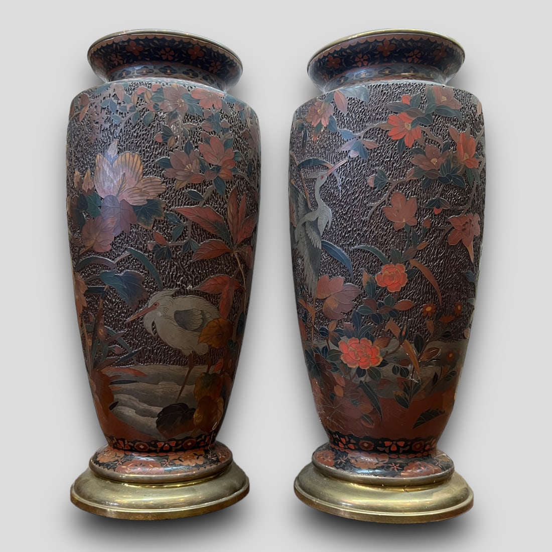 Antique Pair of Japanese Meiji Period Cloisonne Floral Bird Vases: Antique Pair of Japanese Meiji Period Cloisonné Floral Bird Vases Unsigned. Floral design with birds. One vase is repaired on the inside, please see picture no. 5.
