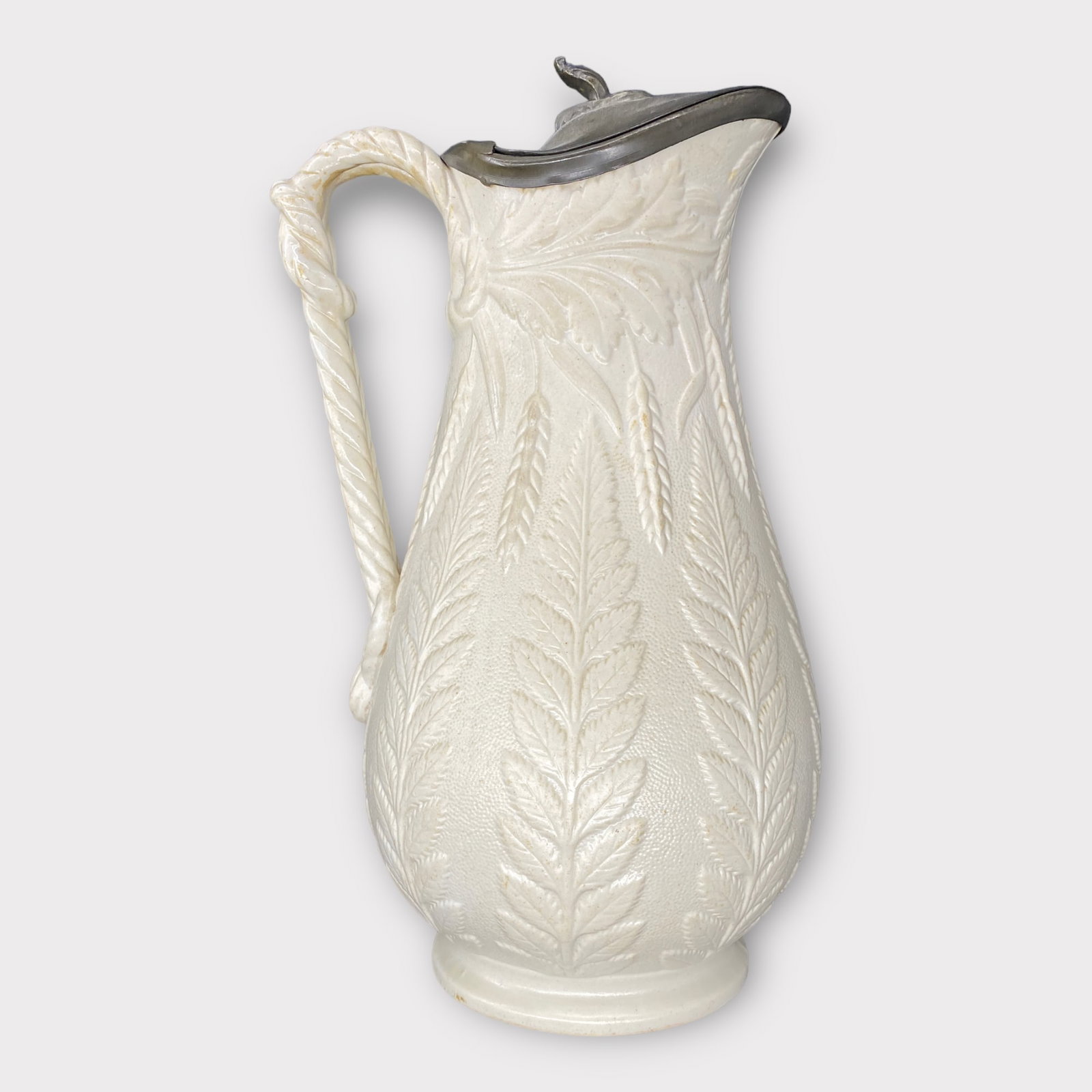 Antique William Brownfield WB Salt Glaze Porcelain Embossed Fern Jug: Antique William Brownfield WB Salt Glaze Porcelain Embossed Fern Jug. Marked on the bottom. Approx. Dimensions: 8.5"H x 4.5"W