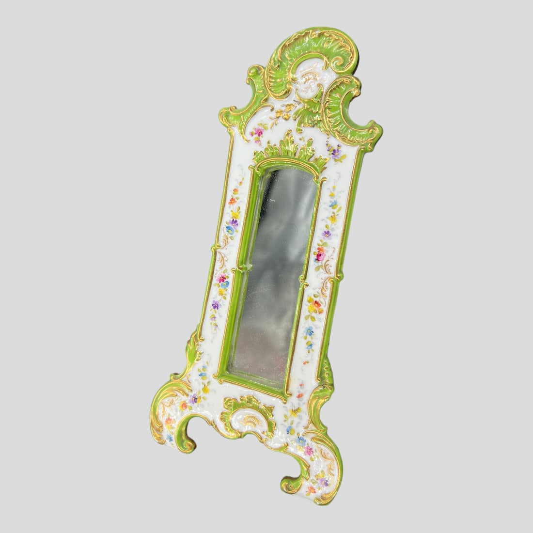 Antique Porcelain Gilt Green Floral Mirror: Antique Porcelain Gilt Green Floral Mirror. Crown marking on the back. Lime green finish.