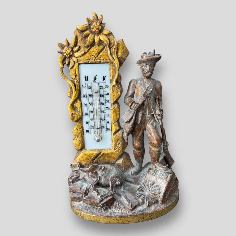 Antique Black Forest Hunter Wood Carved Thermometer: Antique Black Forest Hunter Wood Carved Thermometer. Carving depicts a hunter holding a rifle and standing over a dead deer.