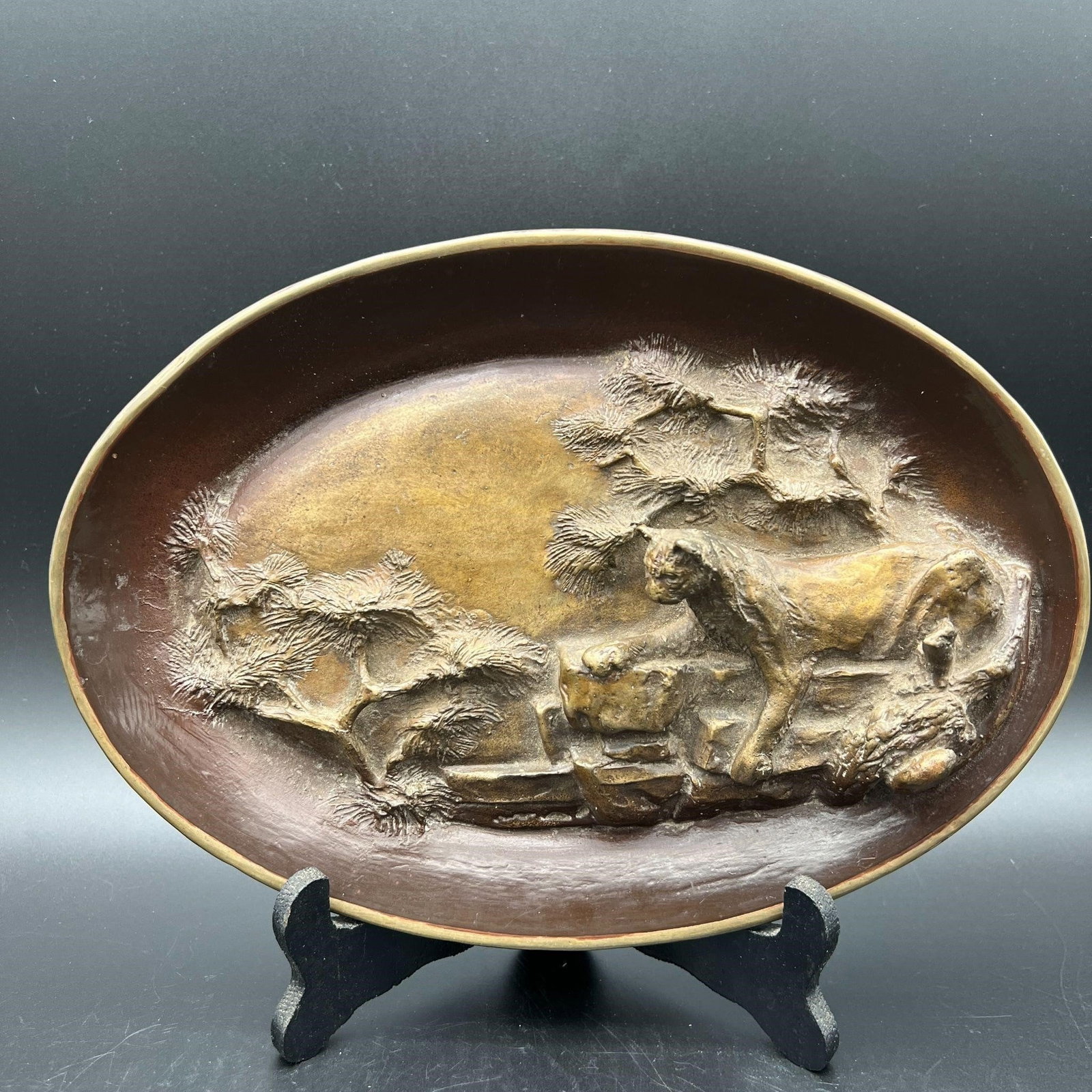 'America's Mysterious Cat' Bronze Relief Sculpture: 'America's Mysterious Cat.' Signed 'Shoop.'Numbered # 10/2500. Dimensions: 1.75" x 11.50" x 8"The entire proceeds from this sale will benefit Bergen County Horse Rescue in Mahwah, NJ. To learn more pl