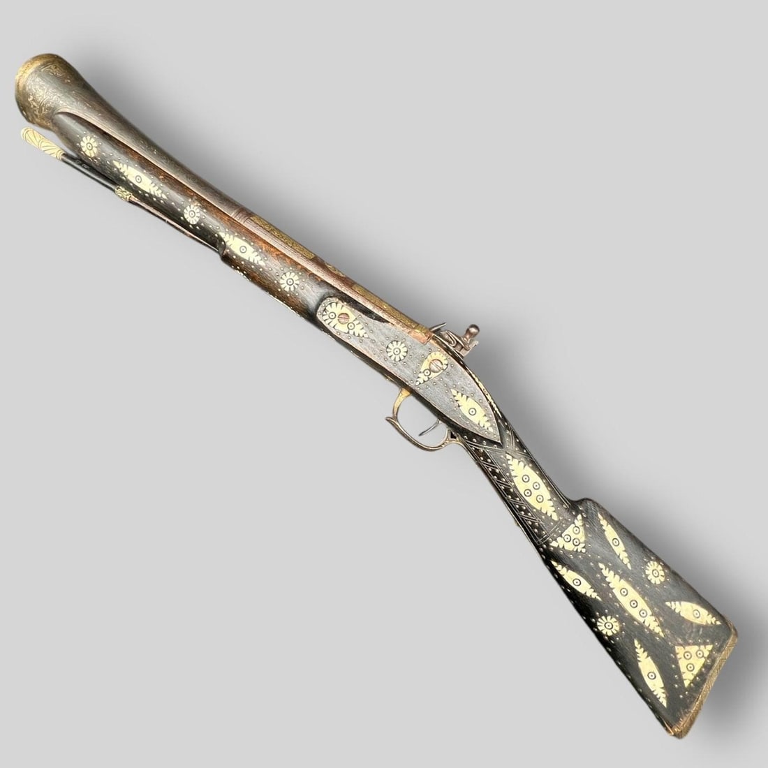 Antique Flintlock Blunderbuss Rifle: Antique Flintlock Blunderbuss Rifle, probably North African, 19th century. Inlay and brass design decorations. Length: 30.75"