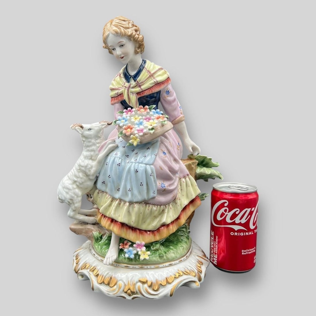 Meissen Floral Porcelain Figurine Girl w/ Goats: German Meissen Floral Porcelain Figurine Girl w/ Goats. Cross-swords marking on the bottom. Appears to be in a very good condition. Dimensions (in): 12.25 x 8 x 6.75