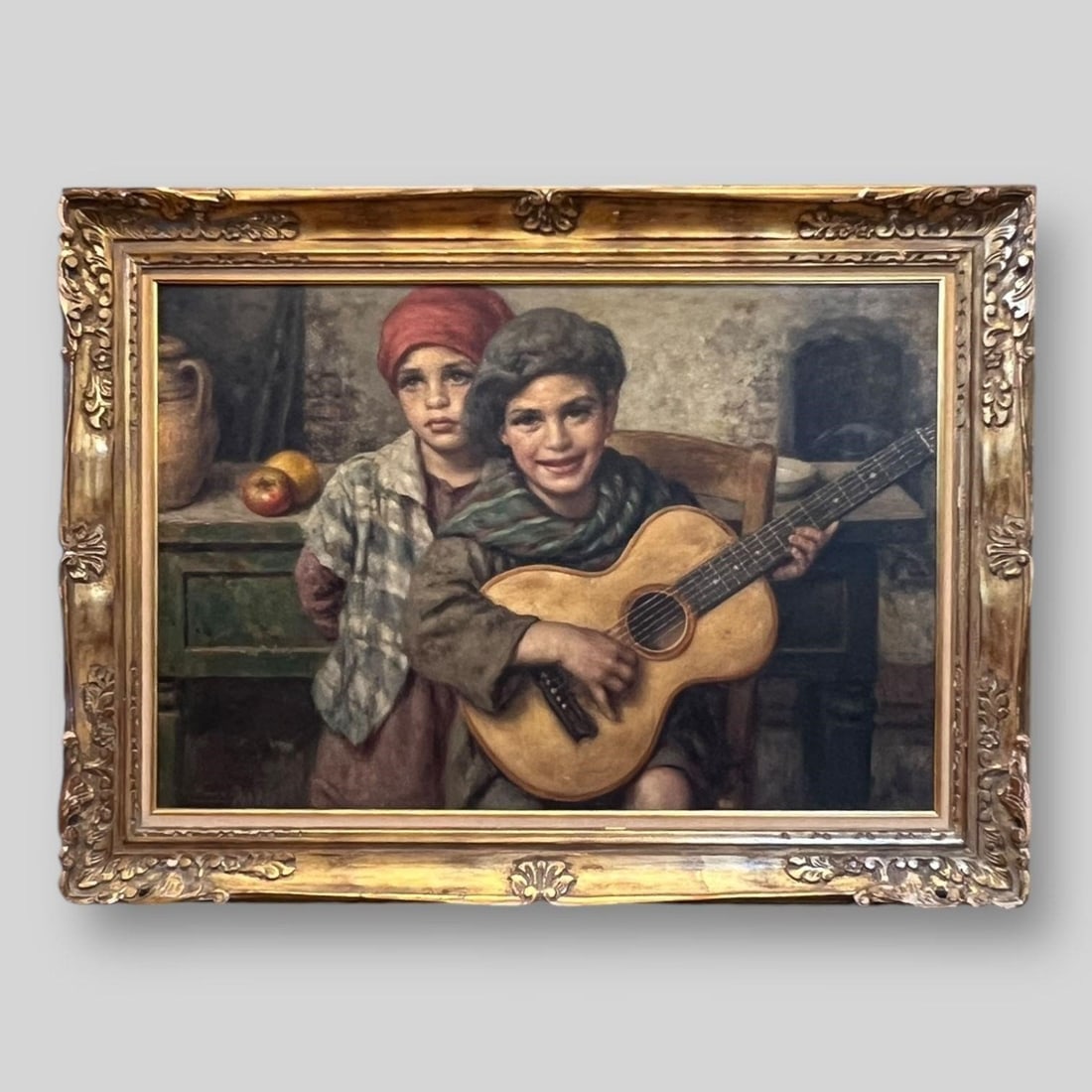 Luigi Amato (Italian 1898-1961) Oil Painting: Luigi Amato (Italian 1898-1961) Oil Painting. Exceptional quality painting of young male boy musician playing a guitar and a girl standing behind him. Painting Size (in): 26.25 x 38.5. Frame Size (in)