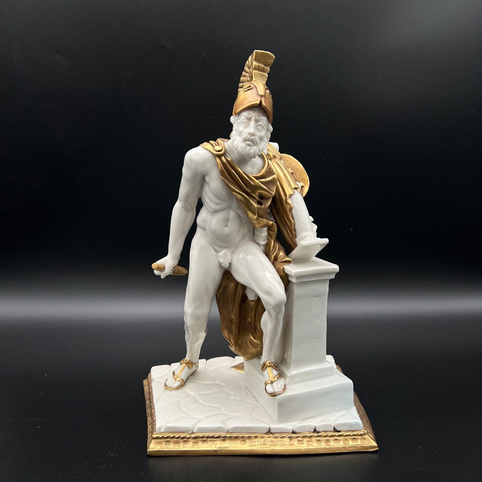 Capodimonte Roman Soldier Porcelain Figurine: Capodimonte Roman Soldier Porcelain Figurine . Signed on the bottom with Capodimonte 'N' crown mark. One small hairline on the neck. Dimensions (in): 11.75 x 7.75 x 5.5.